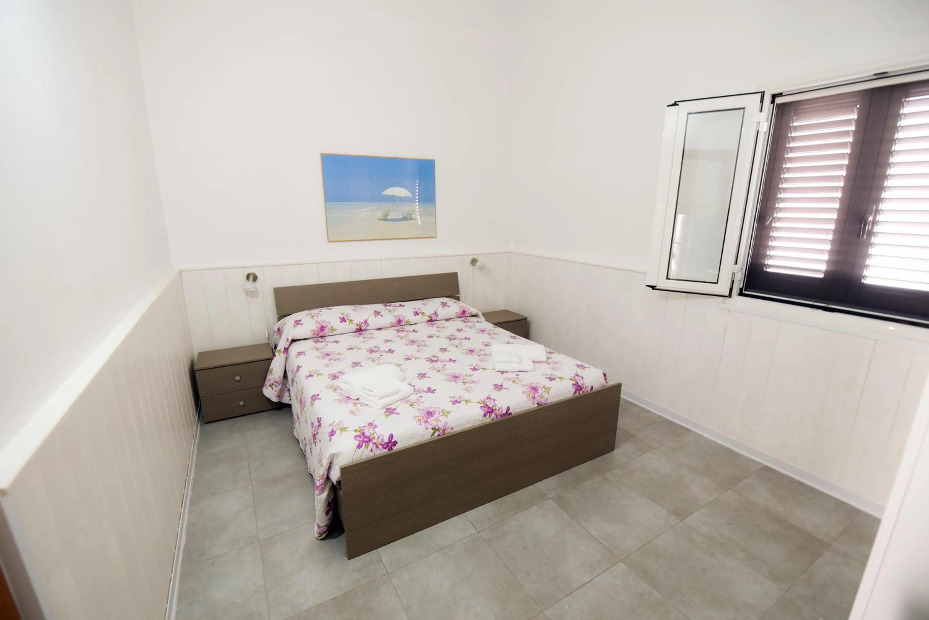 Bed in Giardini Sausari Residence