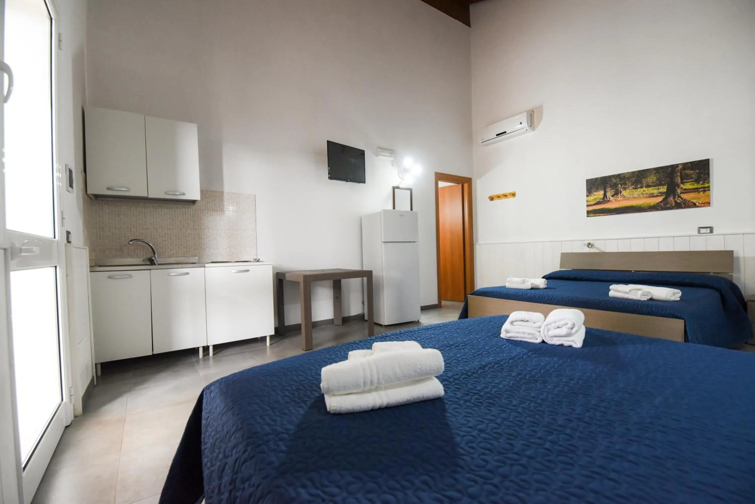 Bed in Giardini Sausari Residence