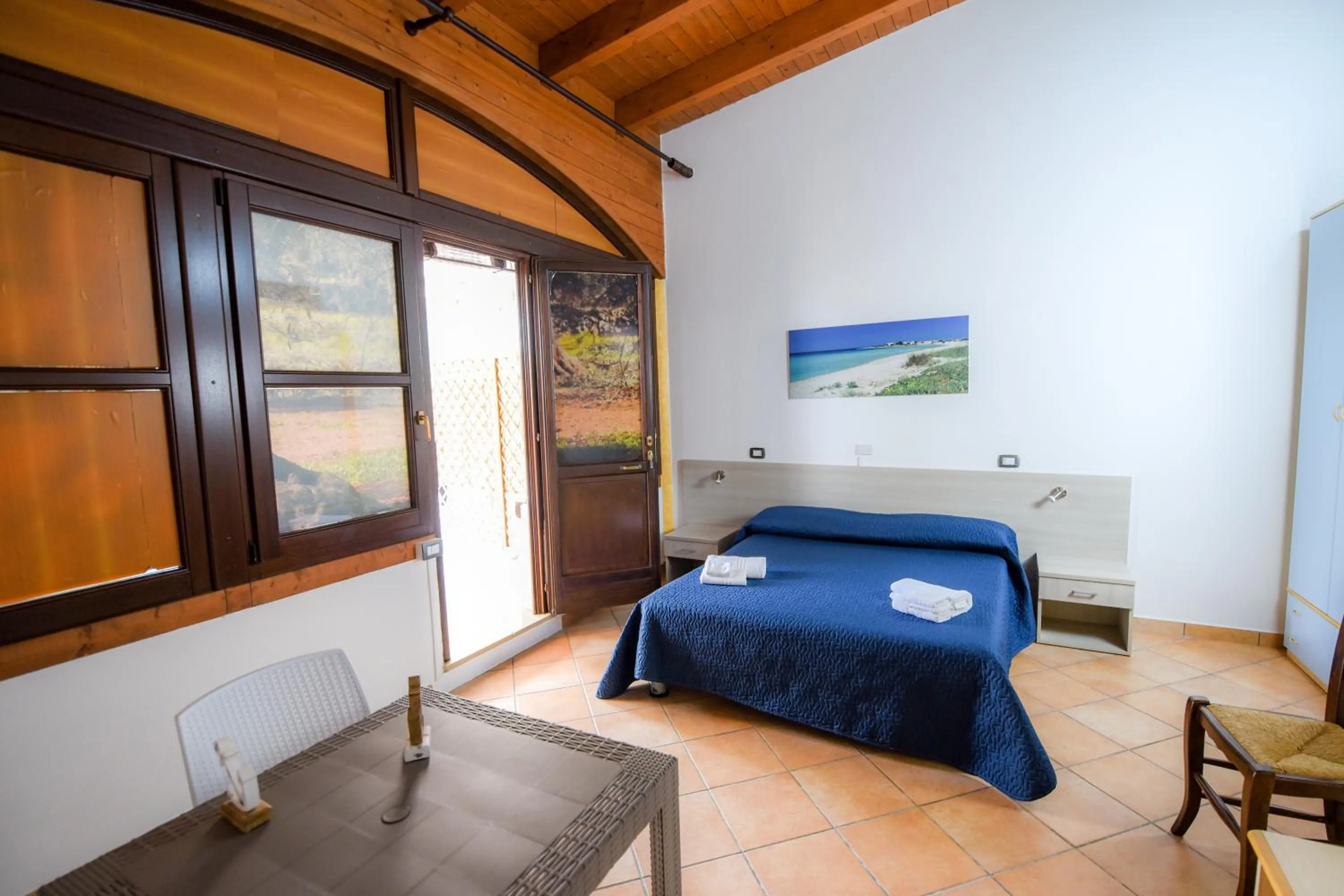 Bed in Giardini Sausari Residence