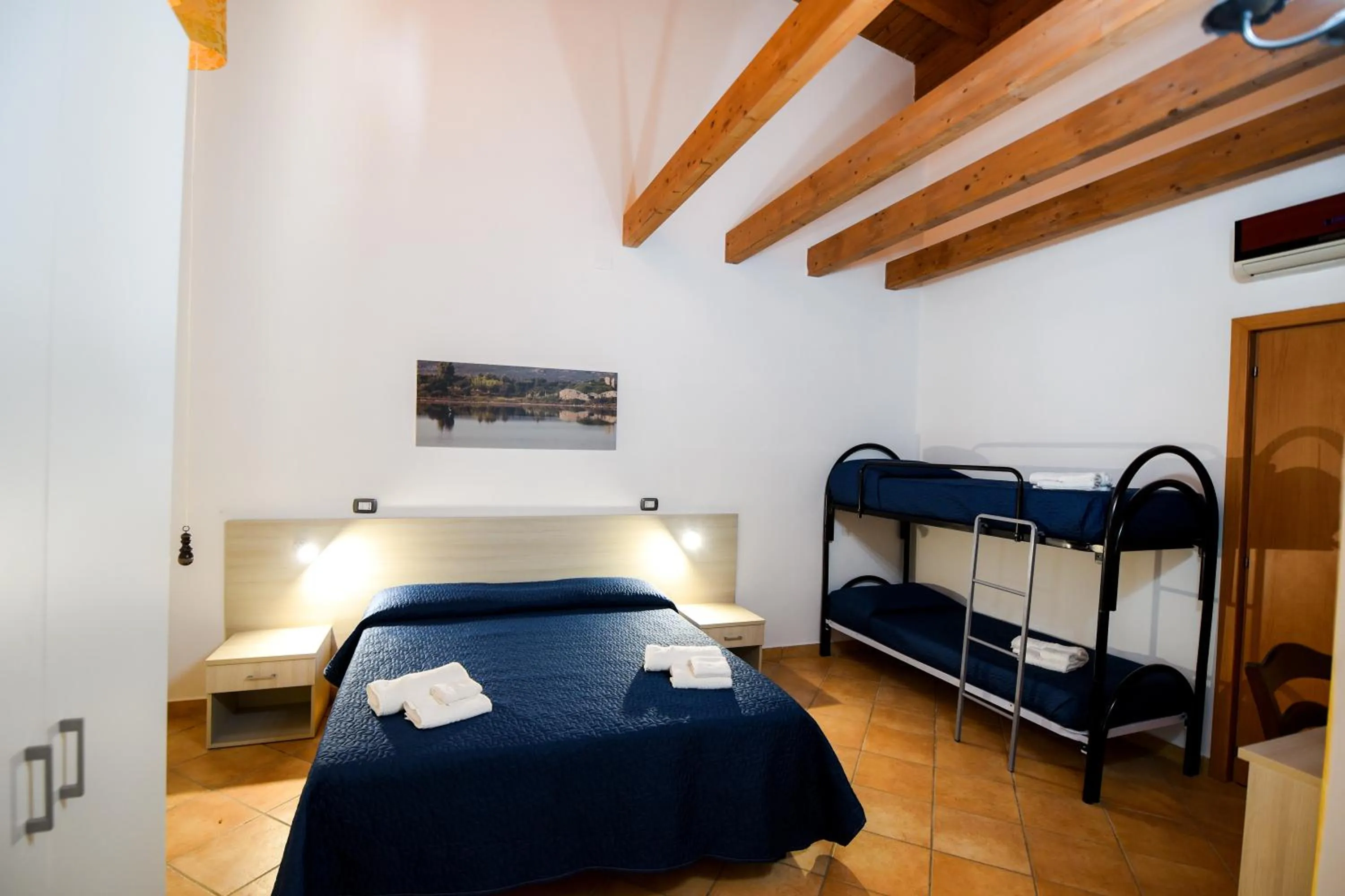 Bed in Giardini Sausari Residence