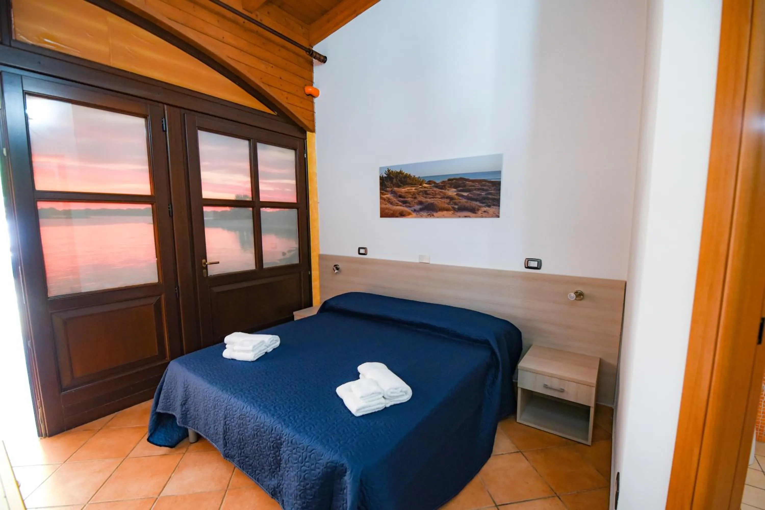 Bed in Giardini Sausari Residence