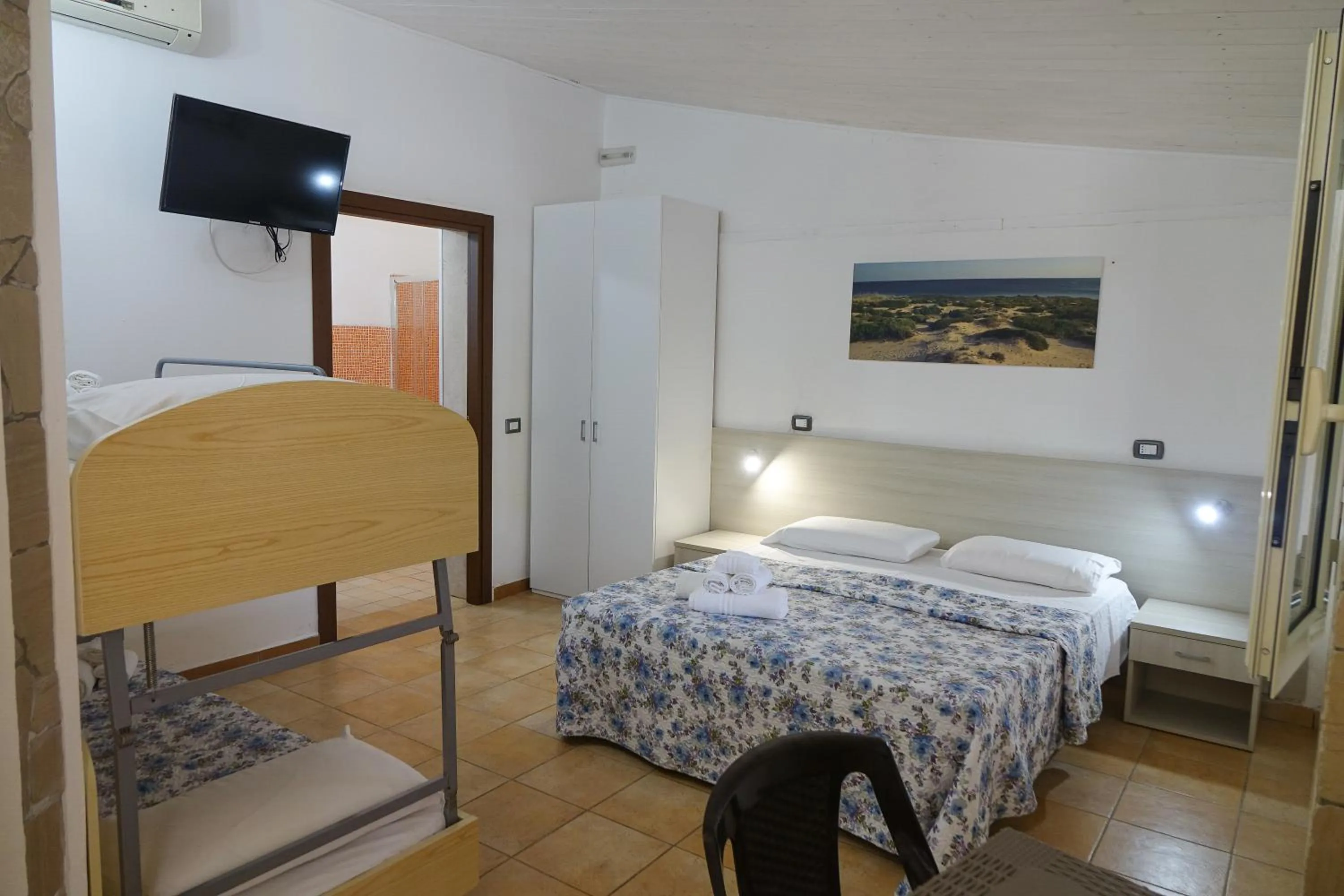 Bed in Giardini Sausari Residence