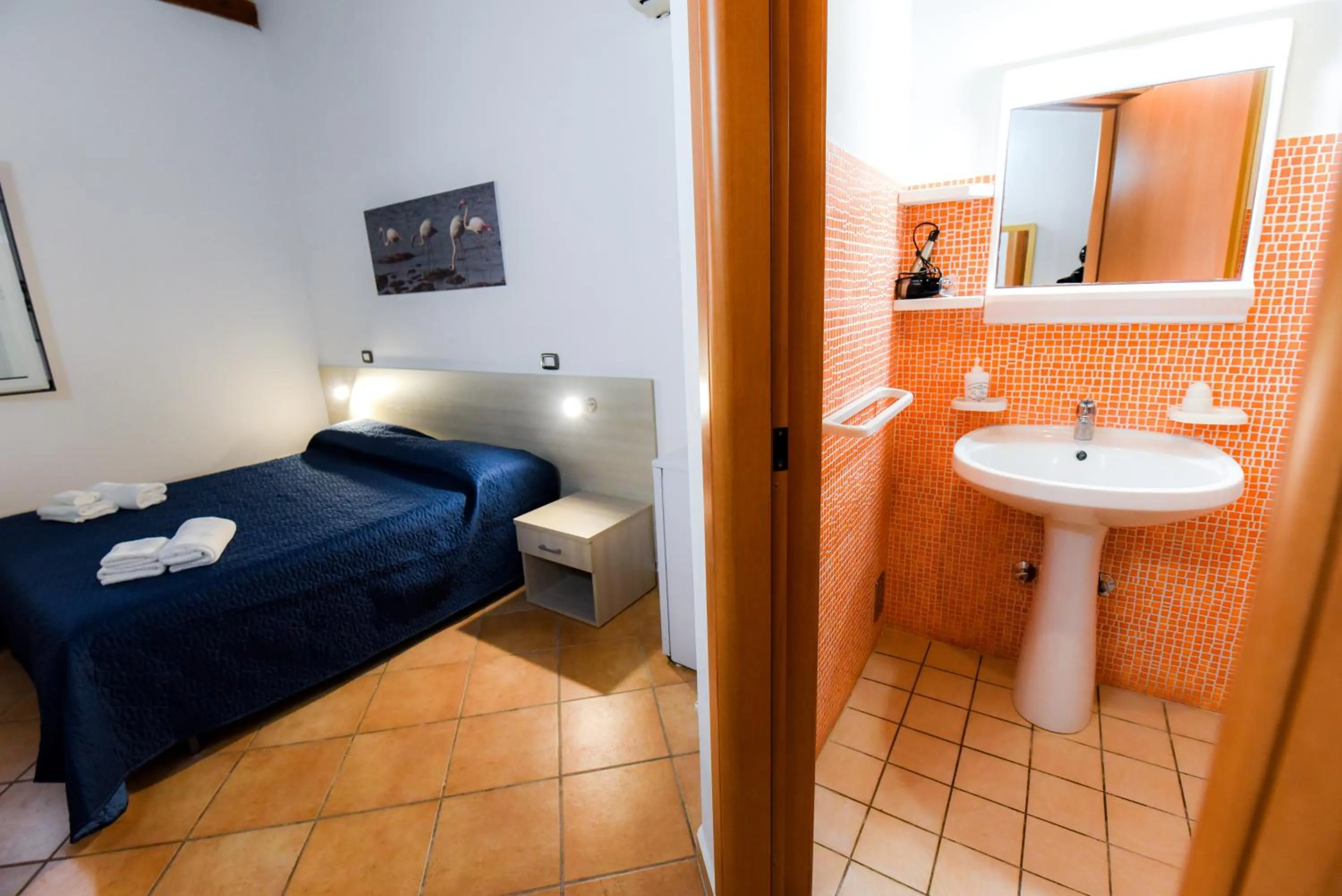 Bathroom, Bed in Giardini Sausari Residence