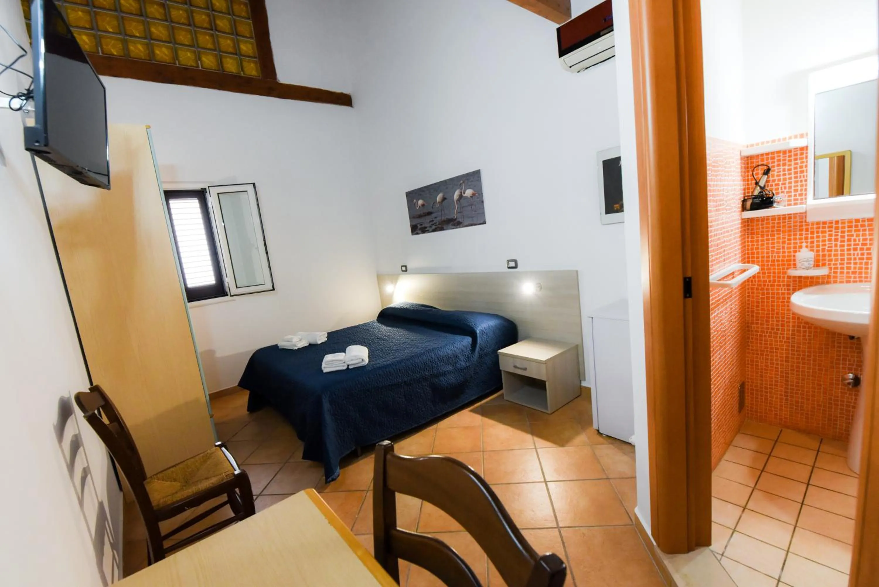 Bed in Giardini Sausari Residence