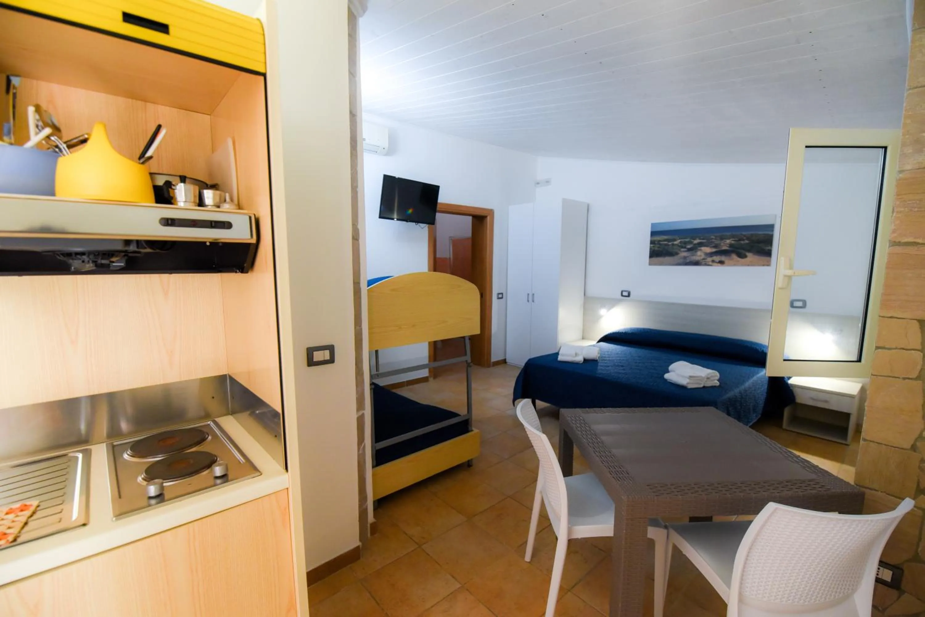 Bed in Giardini Sausari Residence