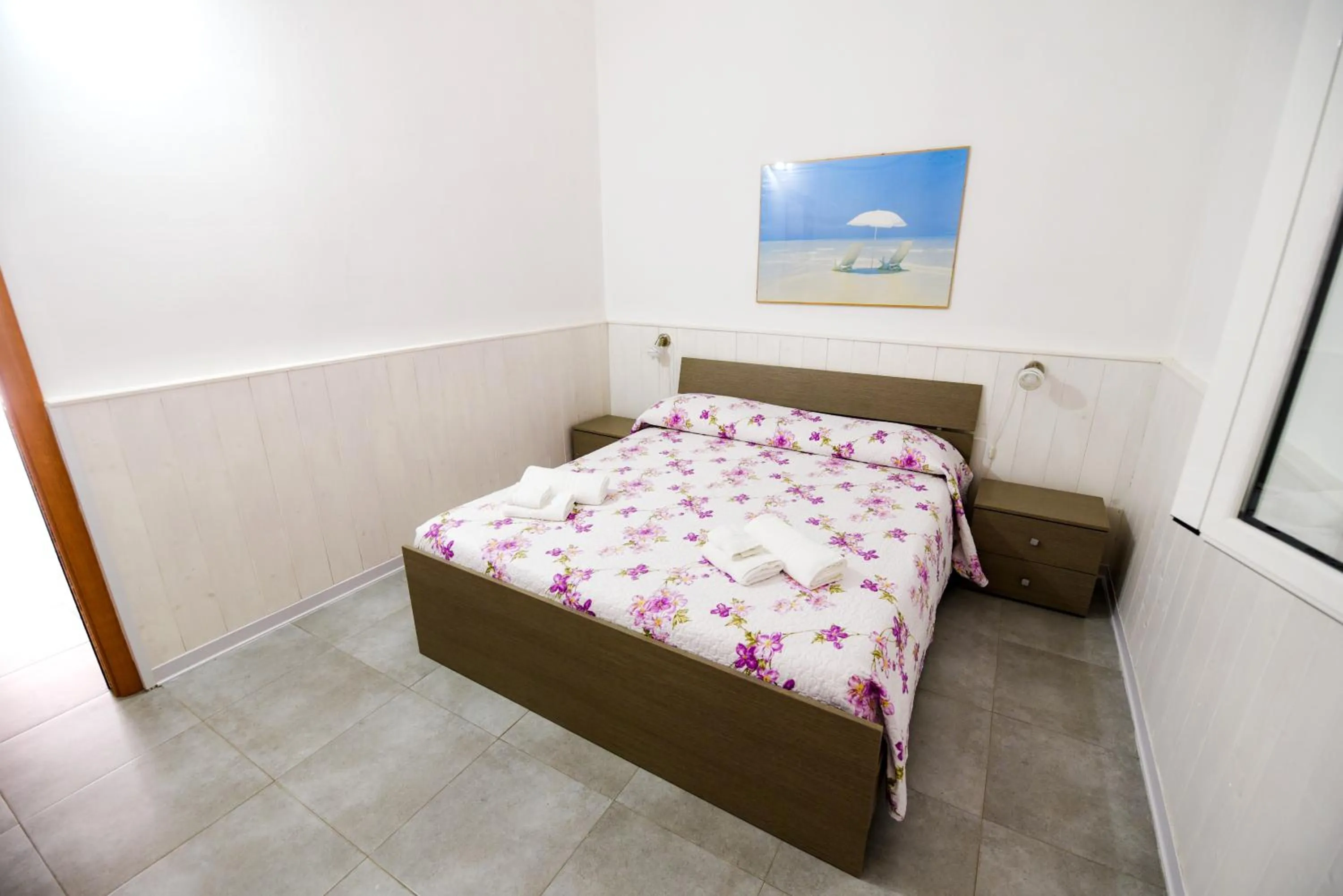 Bed in Giardini Sausari Residence