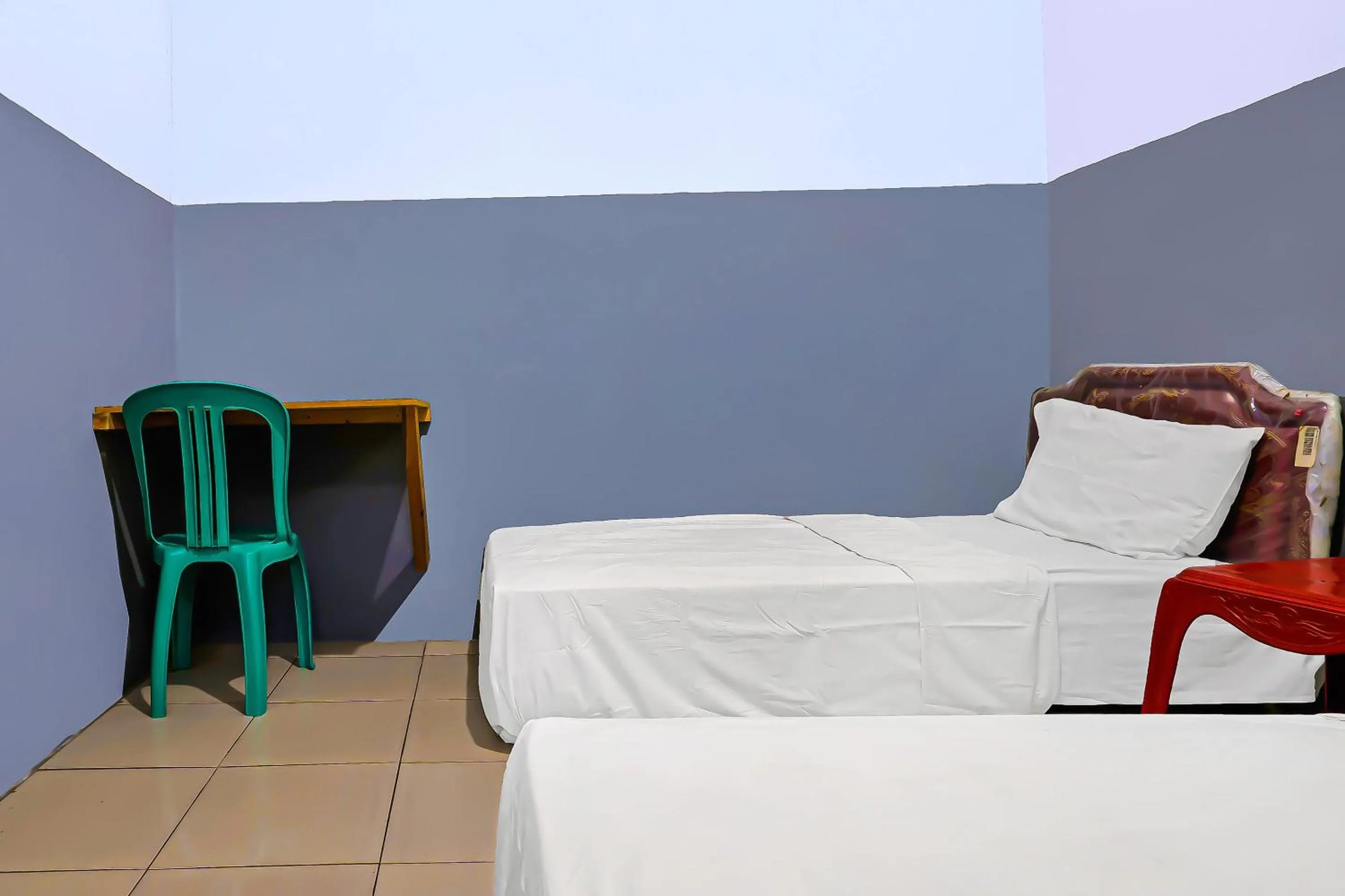 Bedroom in Hotel O Santana Residence Syariah