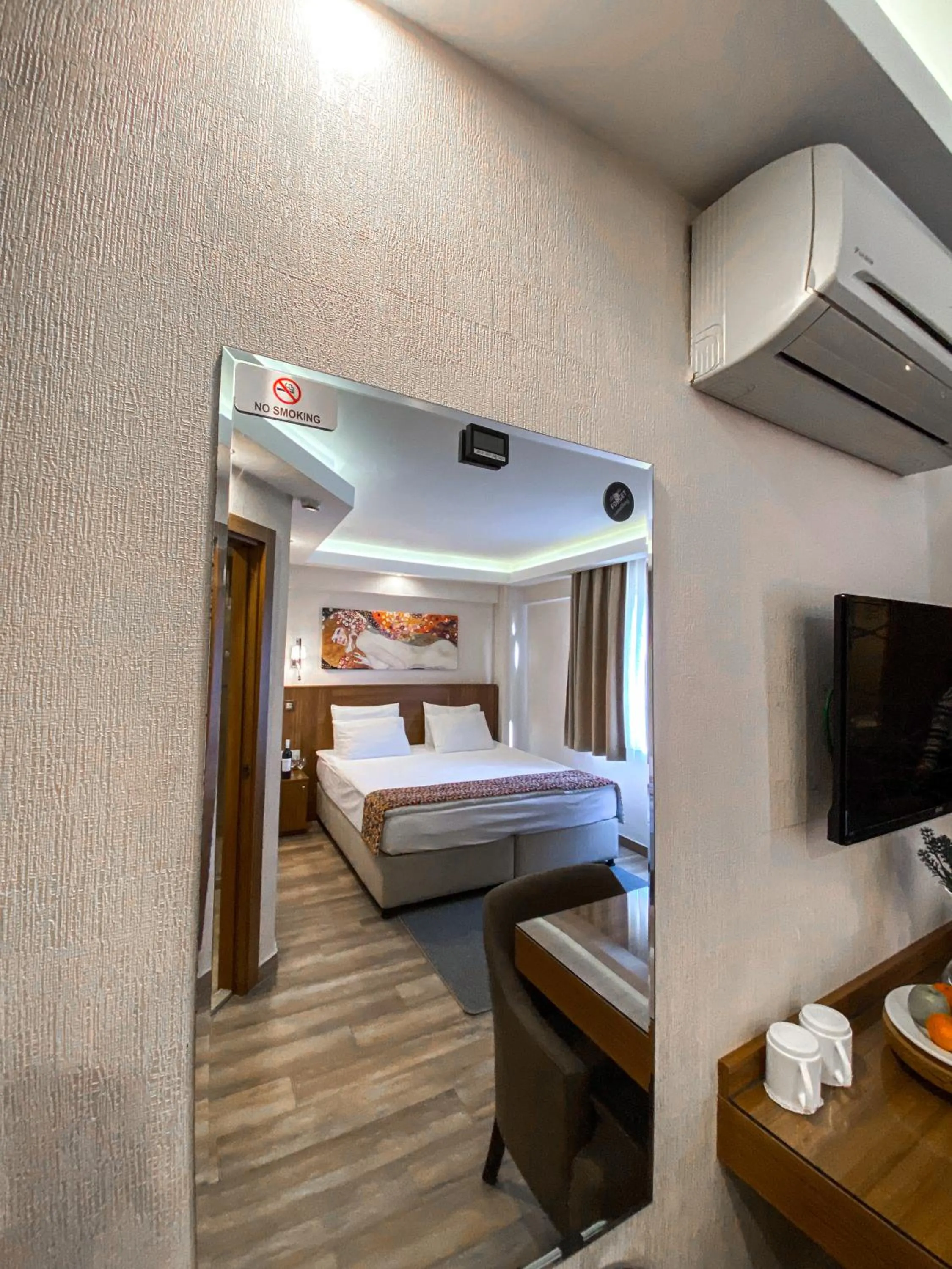 air conditioner, Bed in BGuest Hotel & Residence