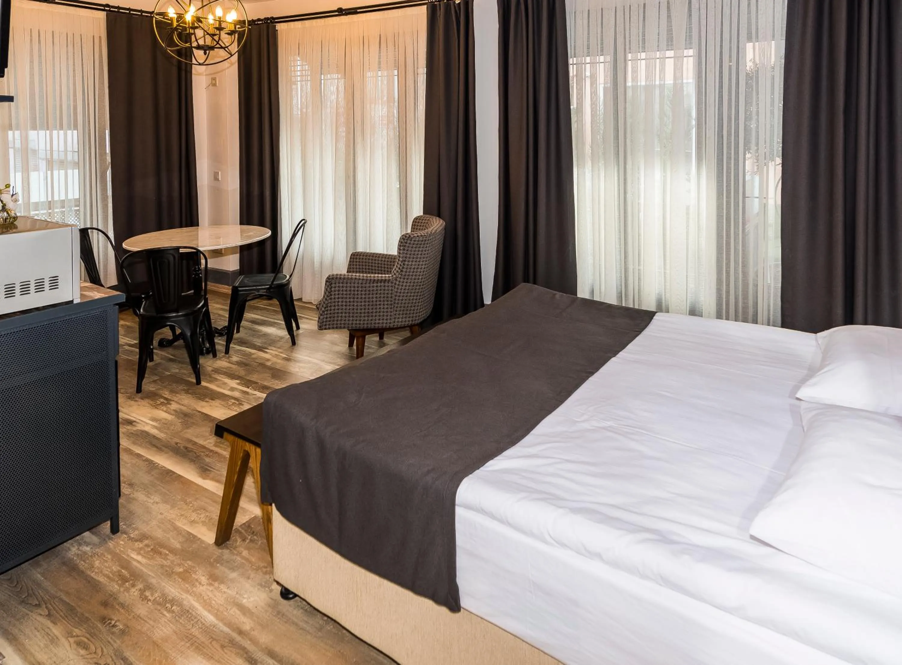 Photo of the whole room, Bed in BGuest Hotel & Residence