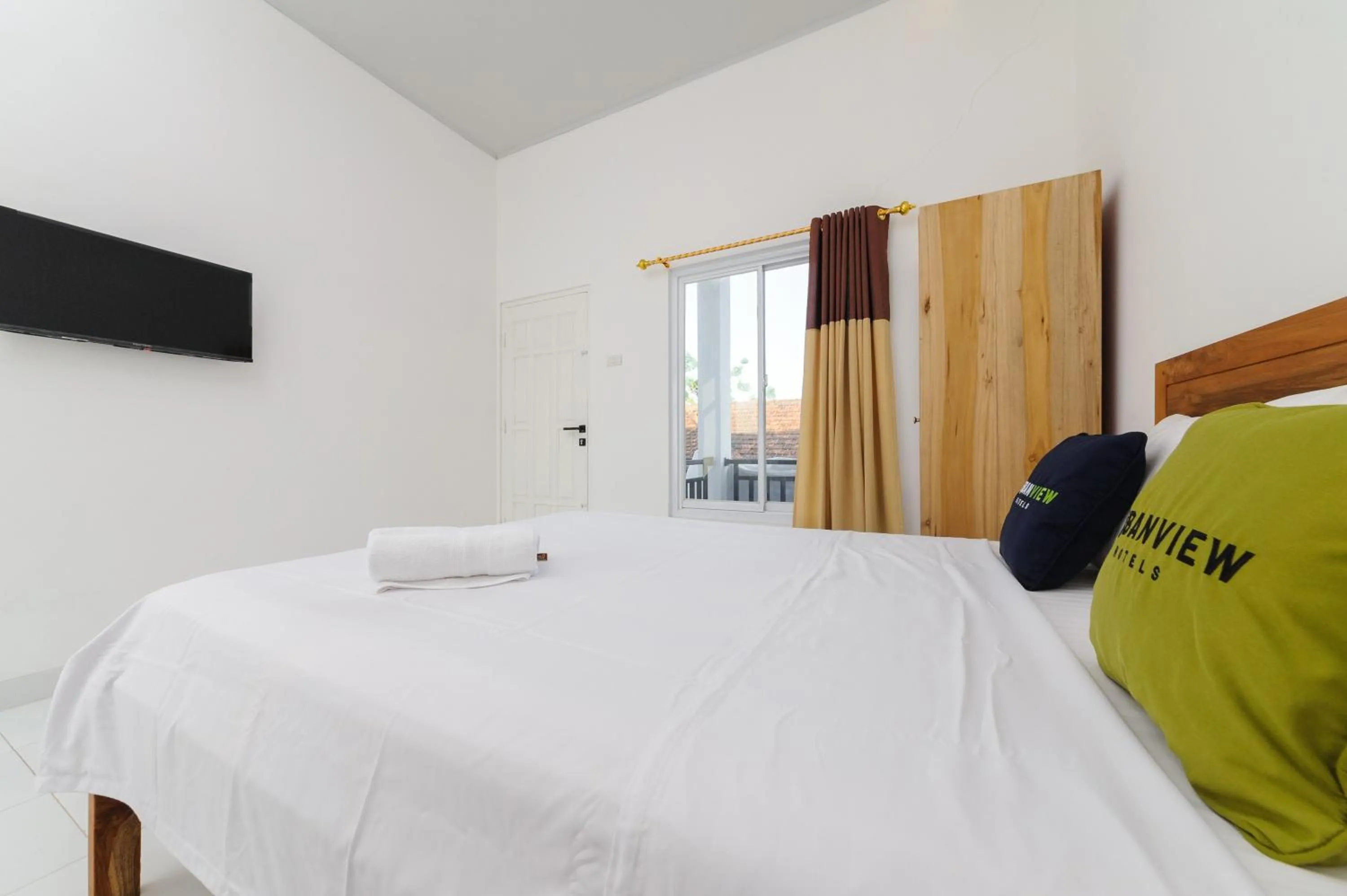 Bed in Urbanview Hotel Betego Syariah Enggal by RedDoorz