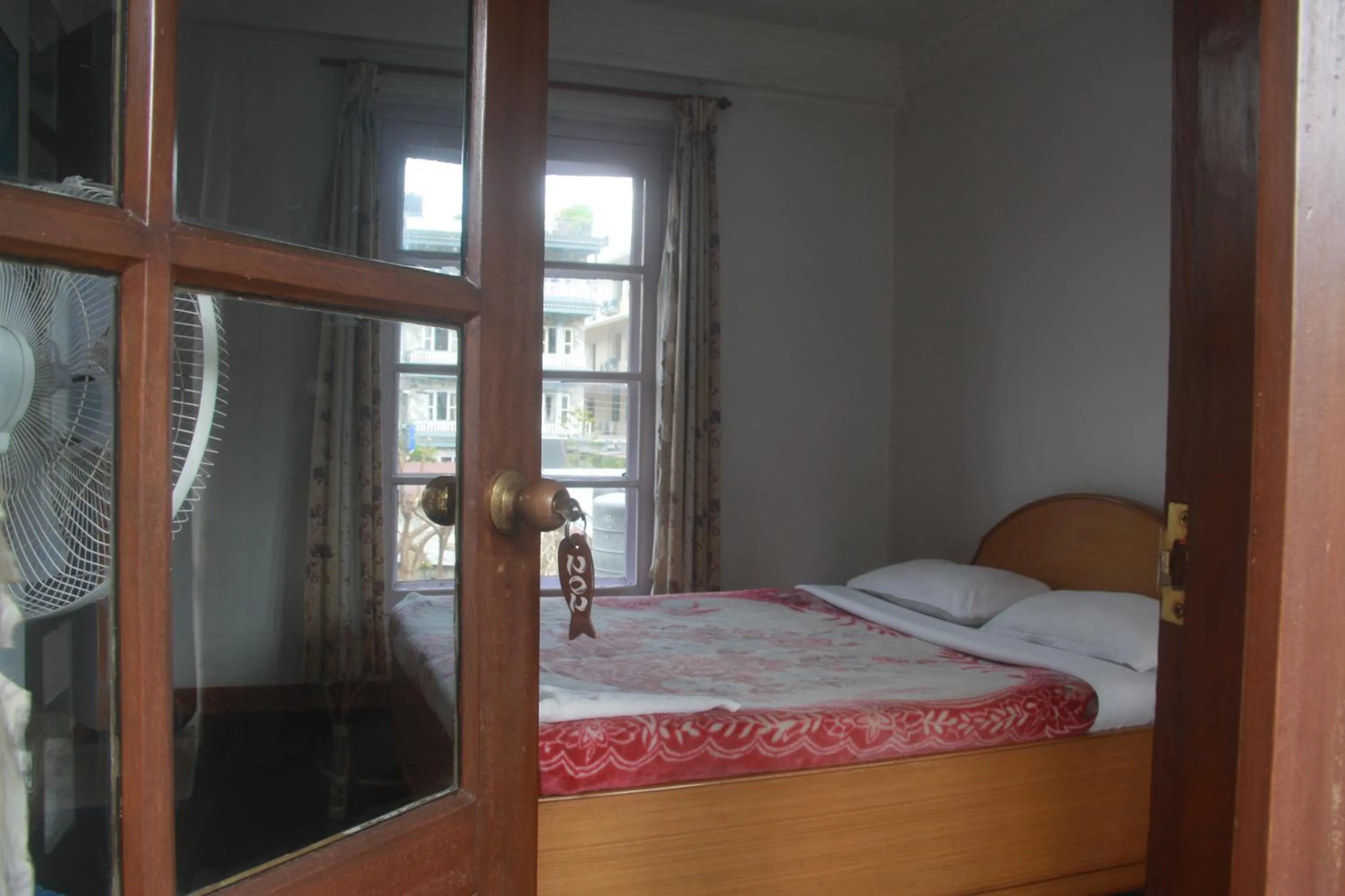 Bed in Vagabond Guest House