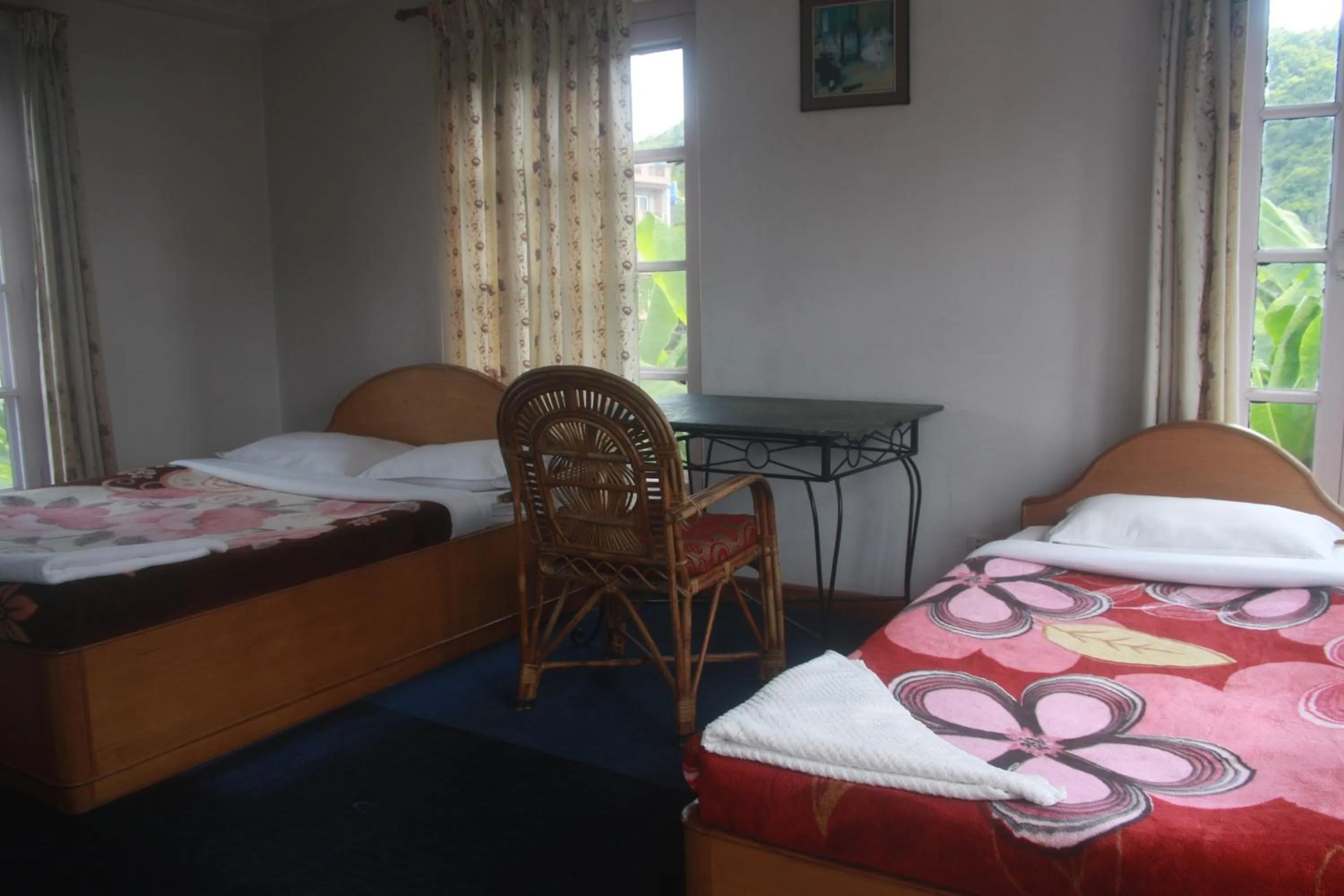 Bed in Vagabond Guest House