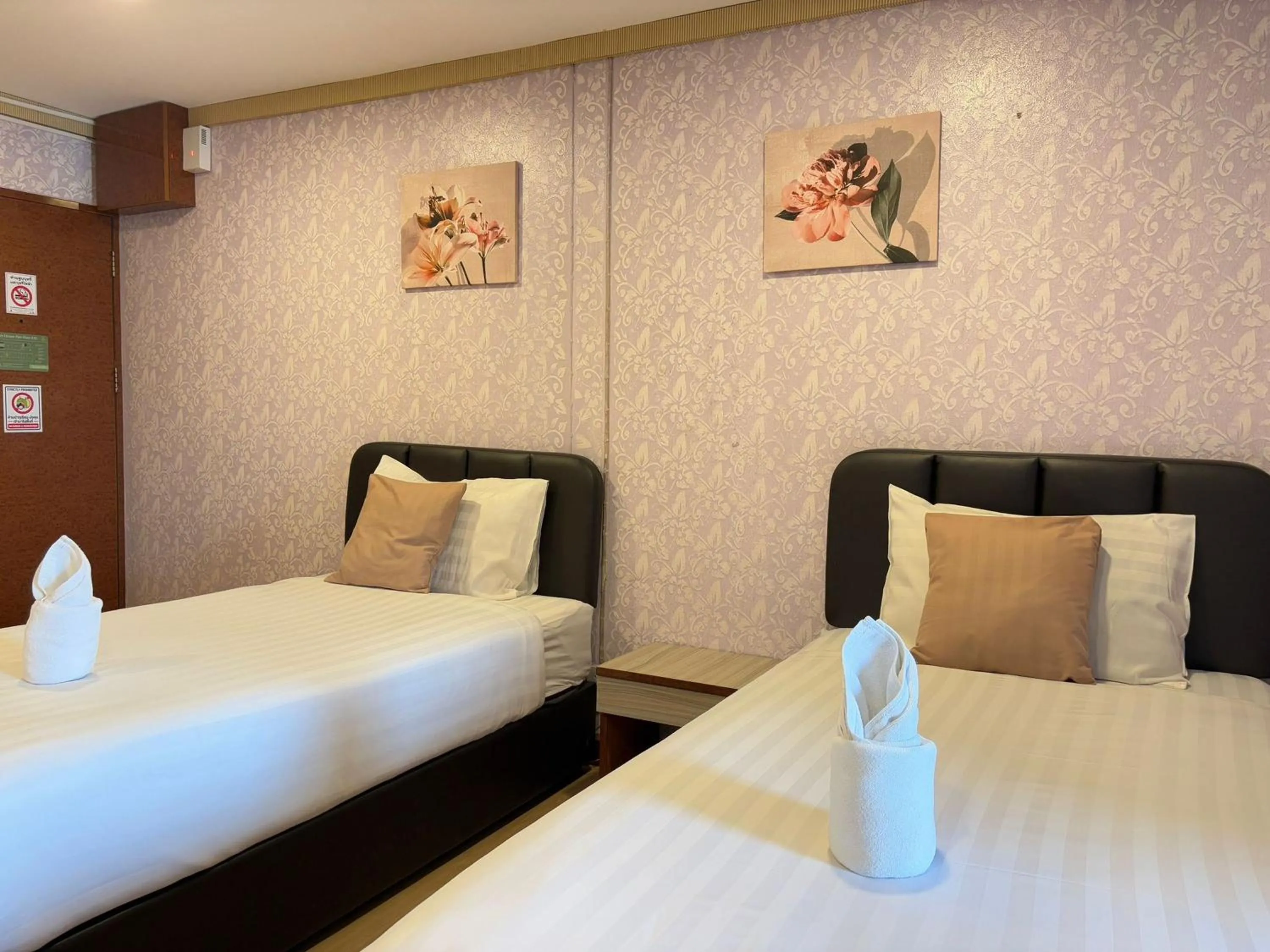 Bed in OYO 75446 Travis Inthamara 49