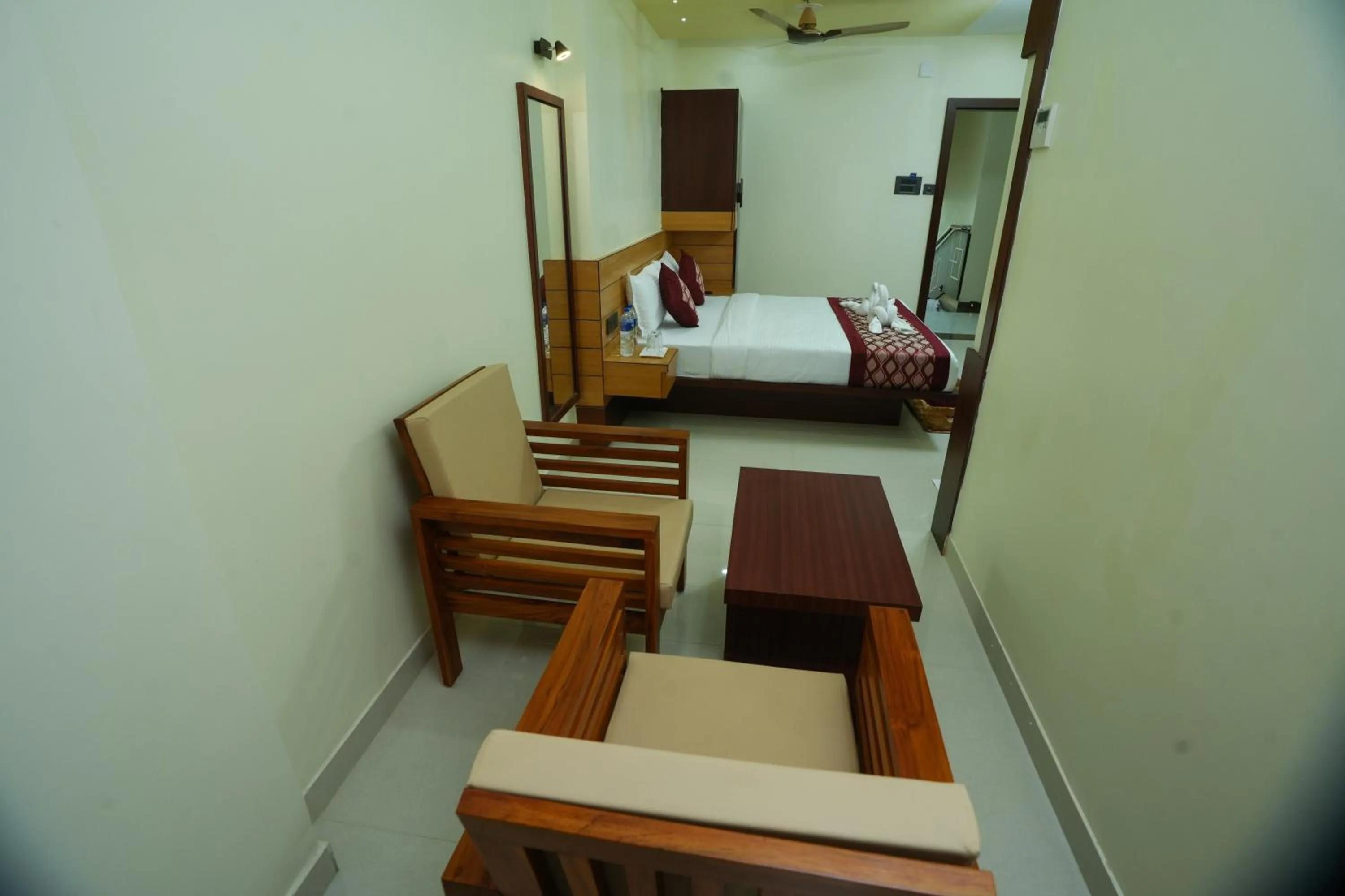 Seating area, Bed in Urban Suites