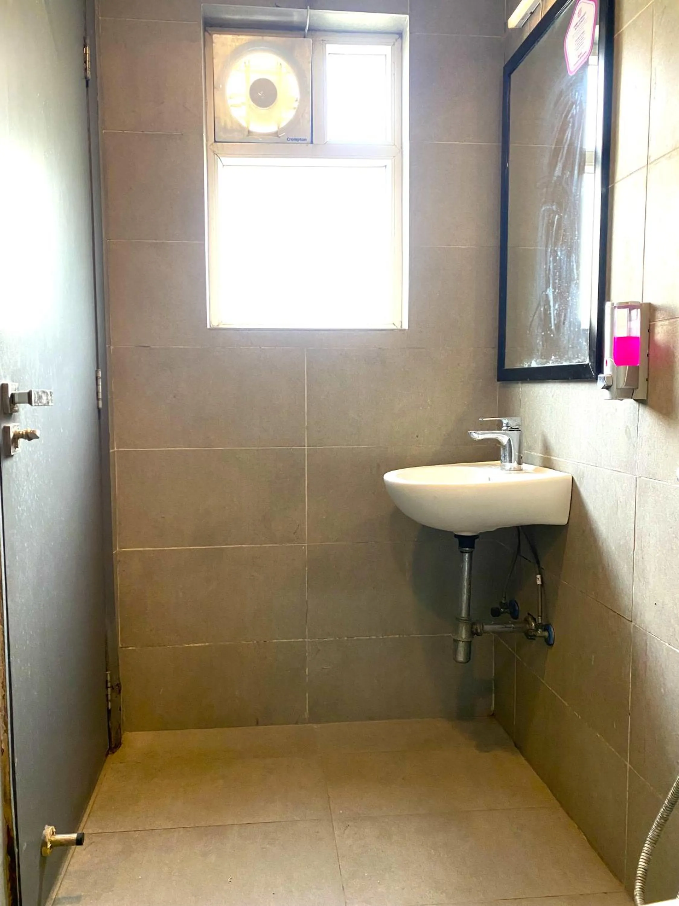 Shower in Qotel Comfort IP Residency East Delhi Preet Vihar