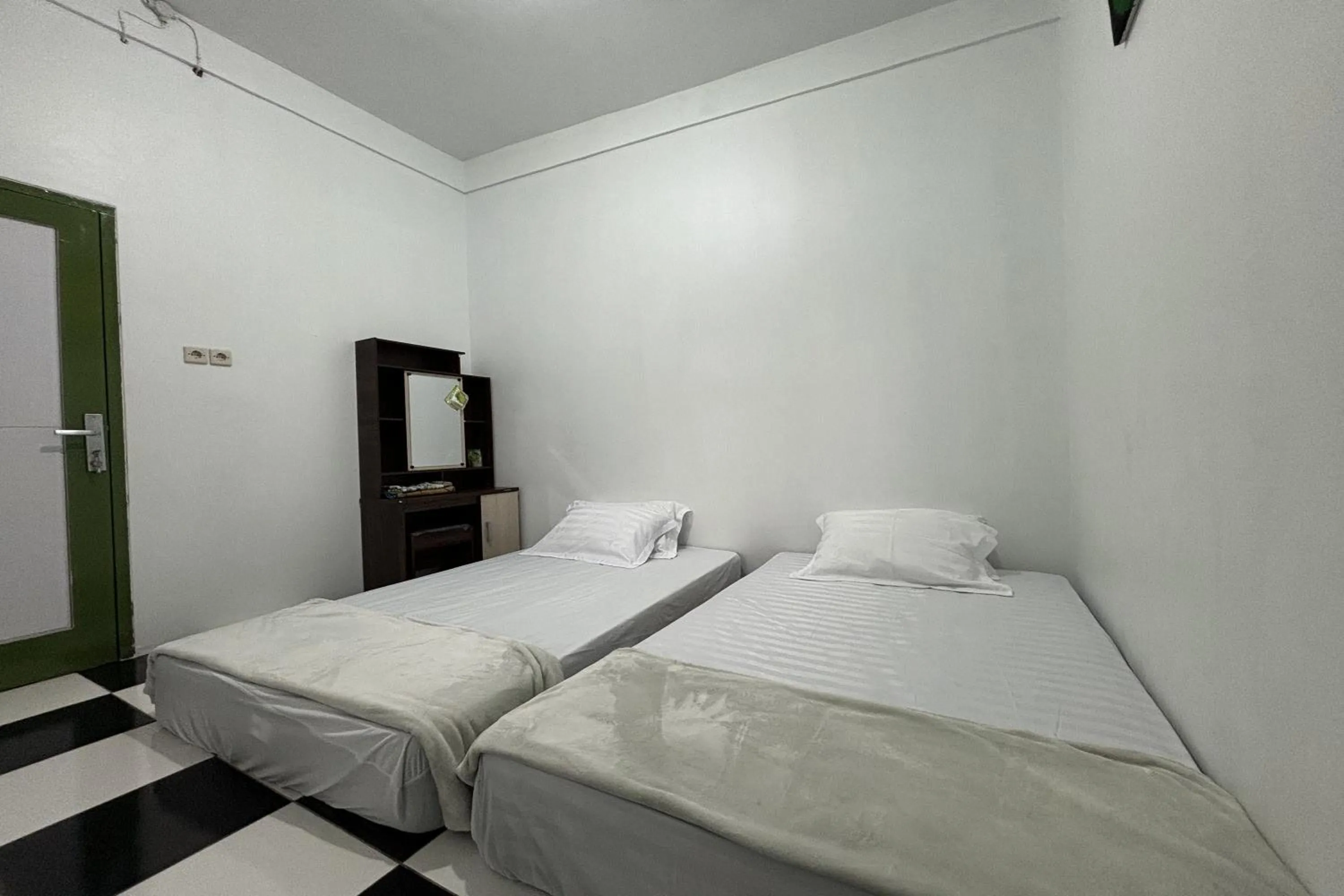 Bedroom in Garden Lounge Villa