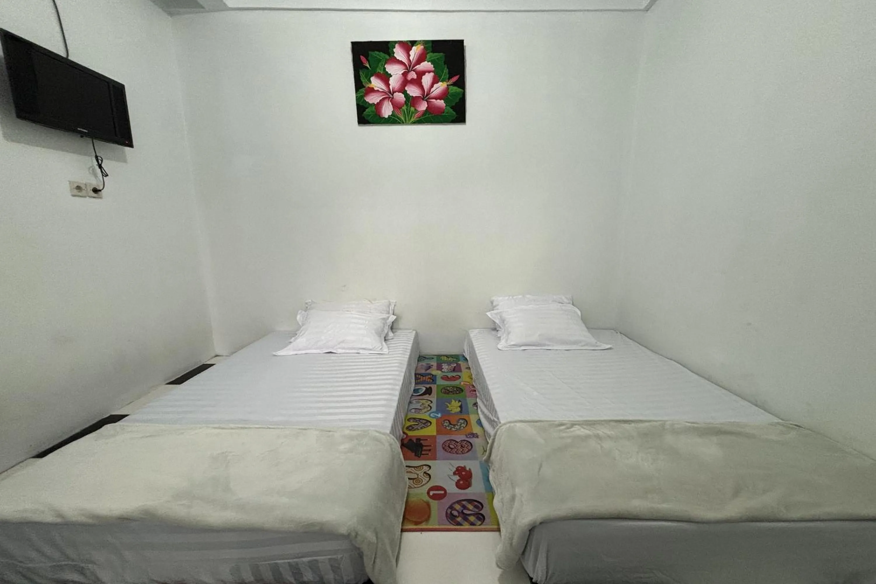 Bedroom in Garden Lounge Villa