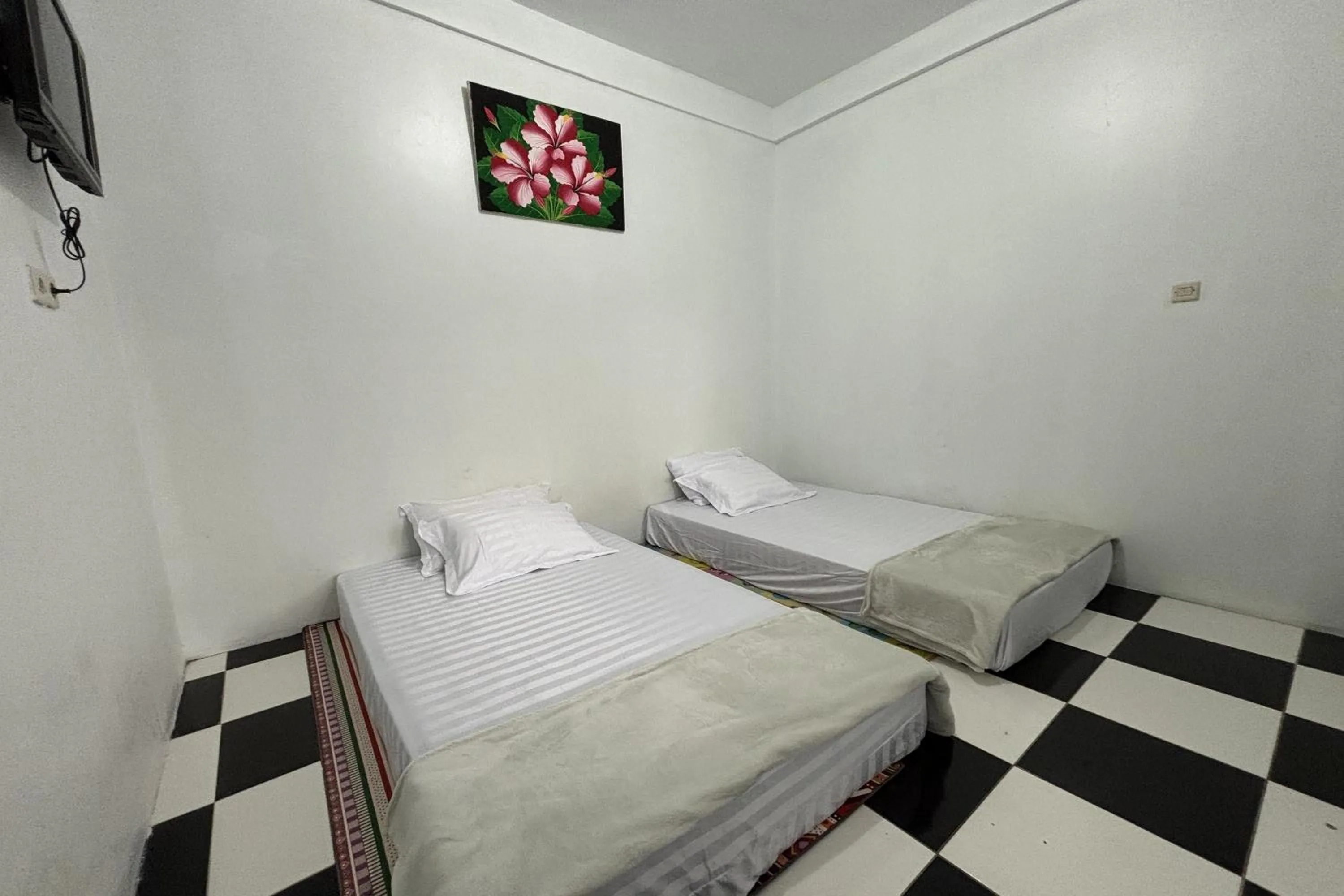 Bedroom in Garden Lounge Villa