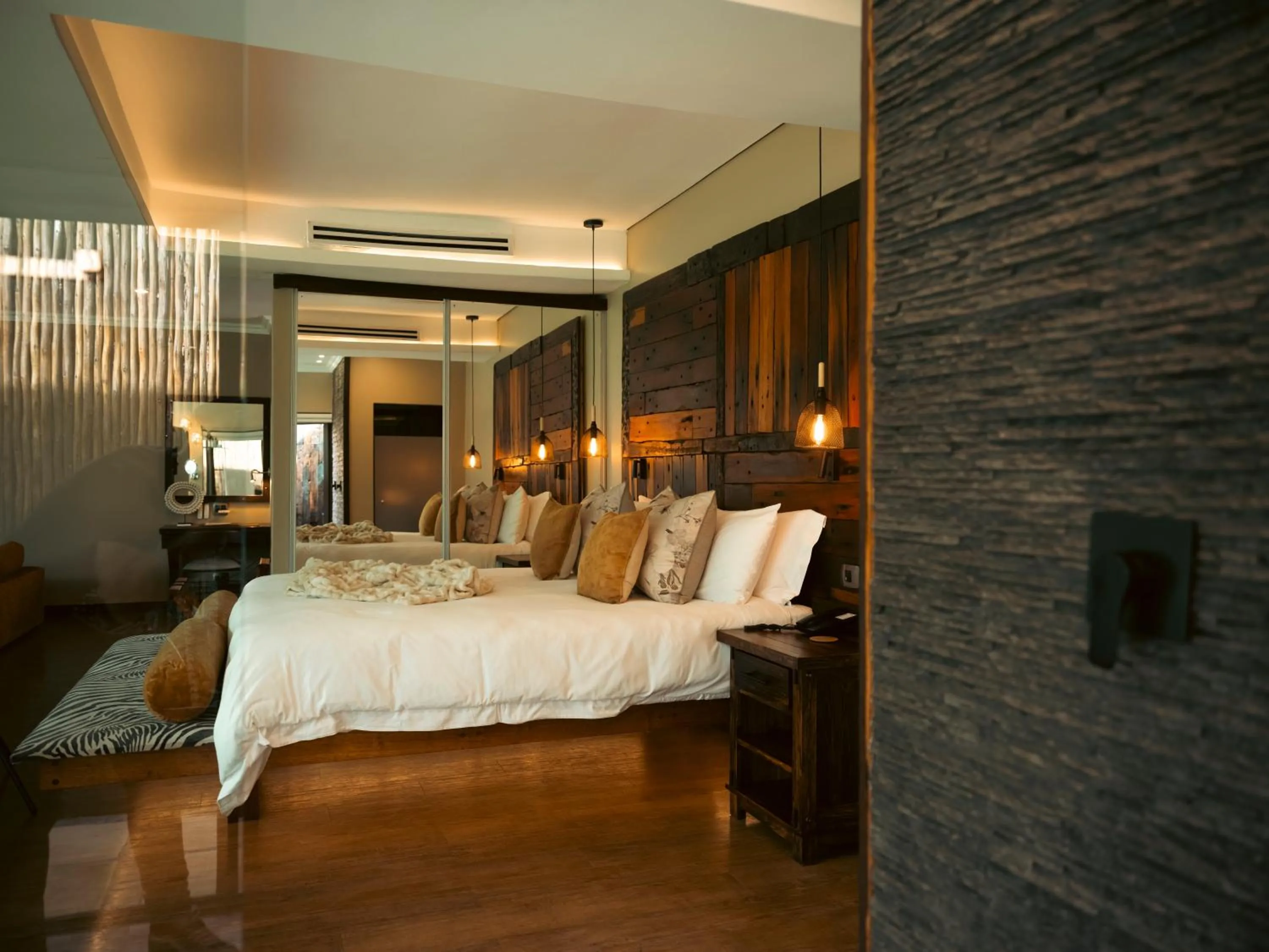 Bed in Shekinah Lion & Game Lodge