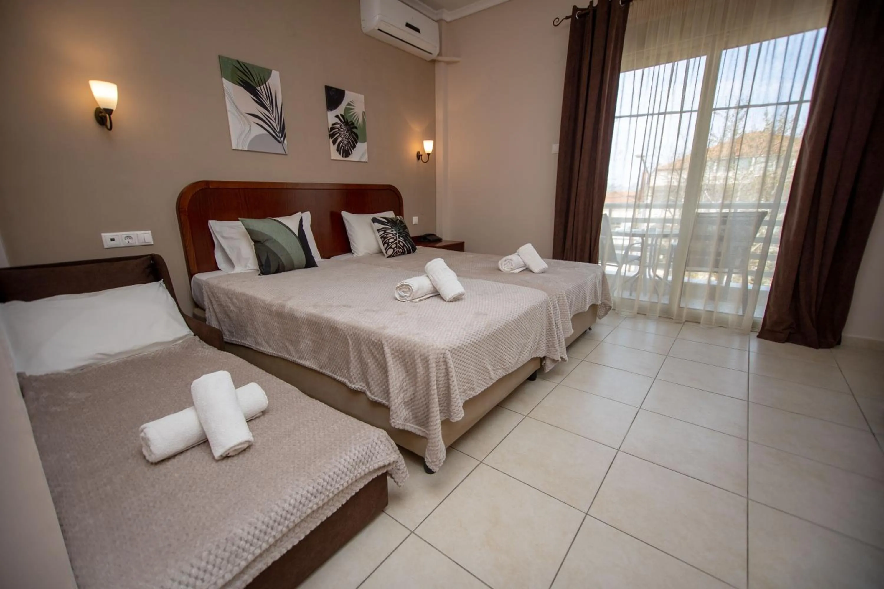 Bed in Hotel Strimoniko