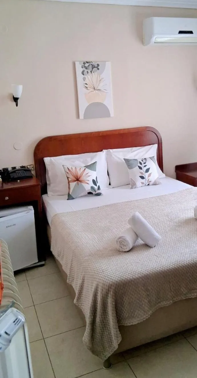 Bed in Hotel Strimoniko