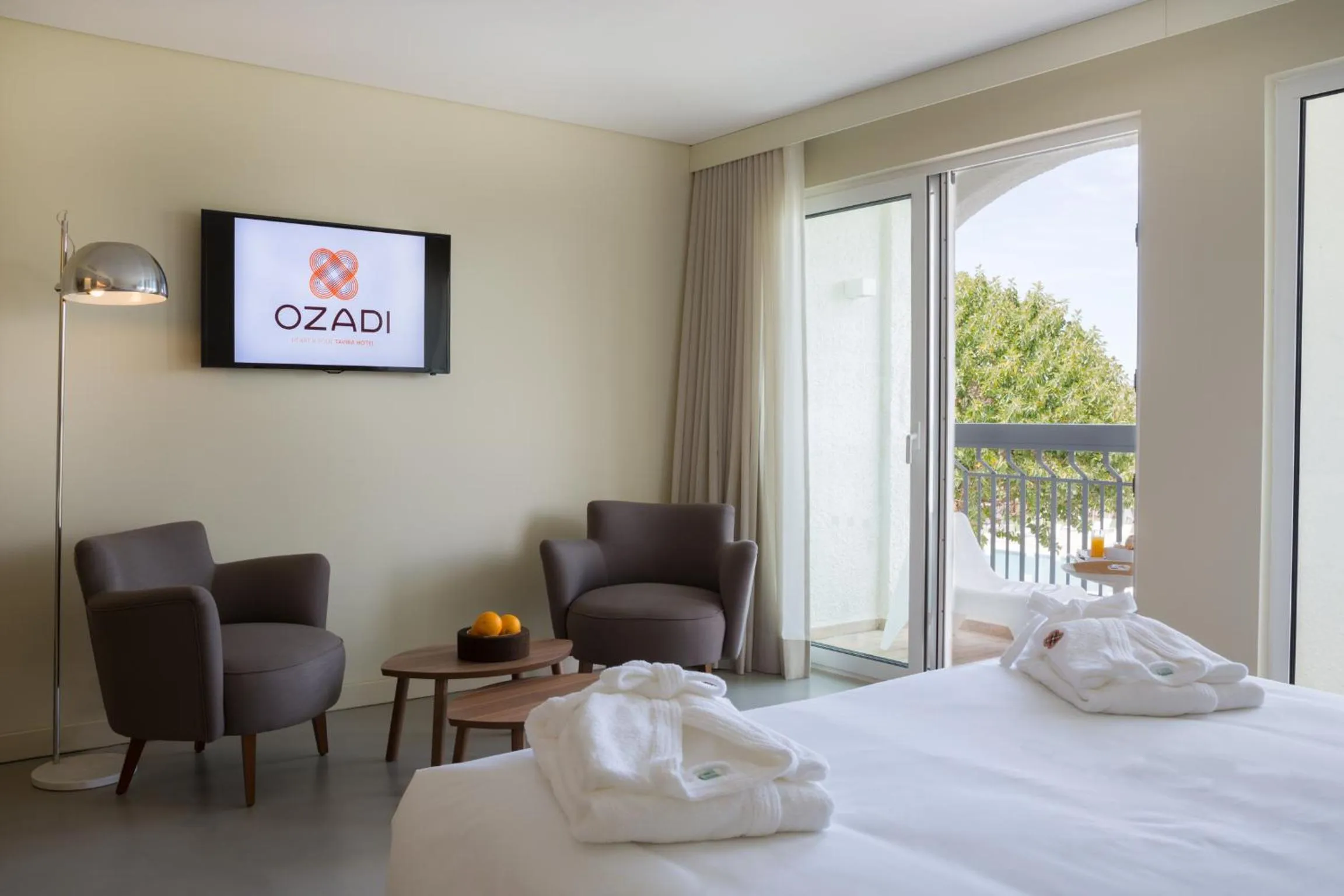 Photo of the whole room, Bed in OZADI Tavira Hotel