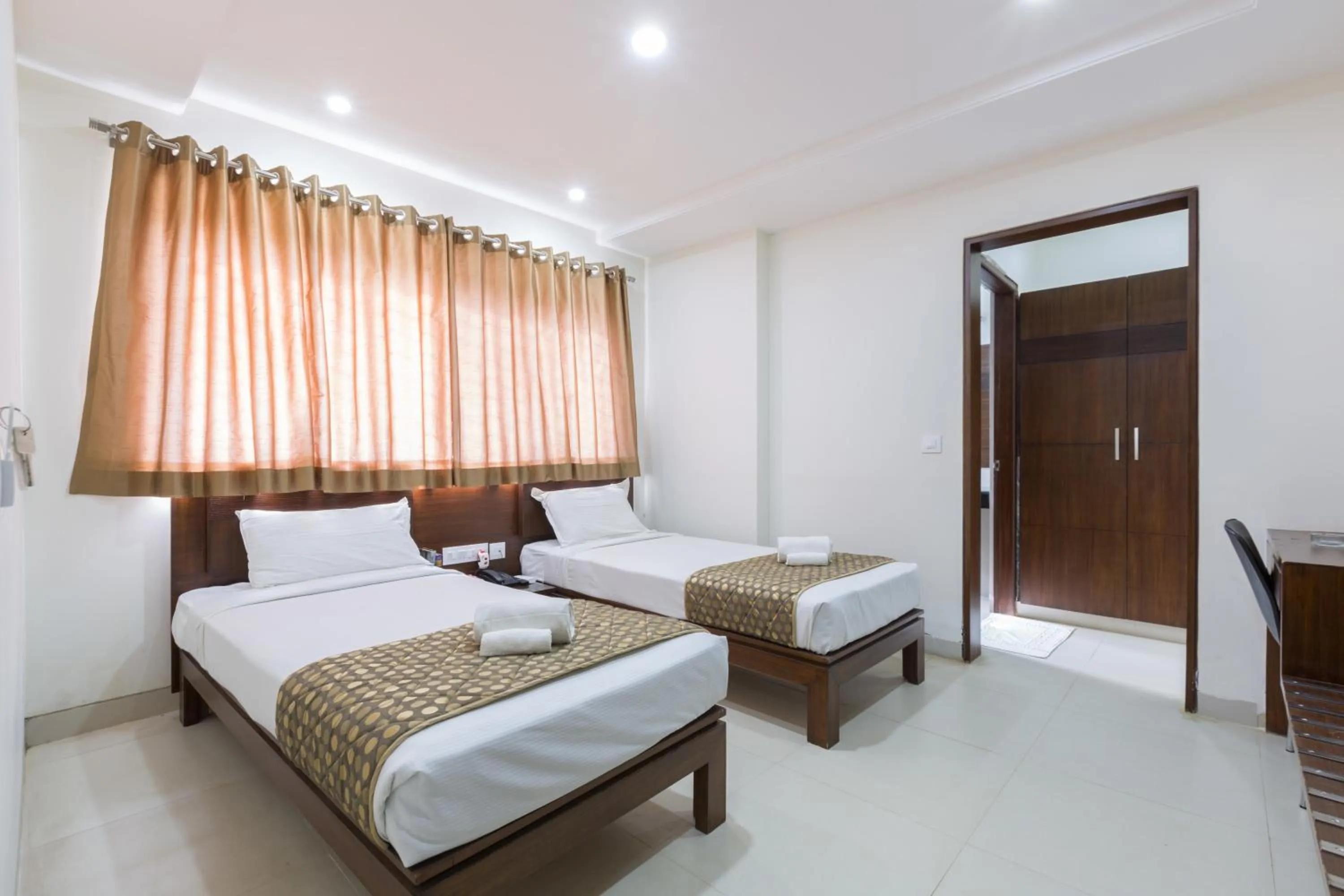 Bed in Sanctum Suites BEL Road Bangalore