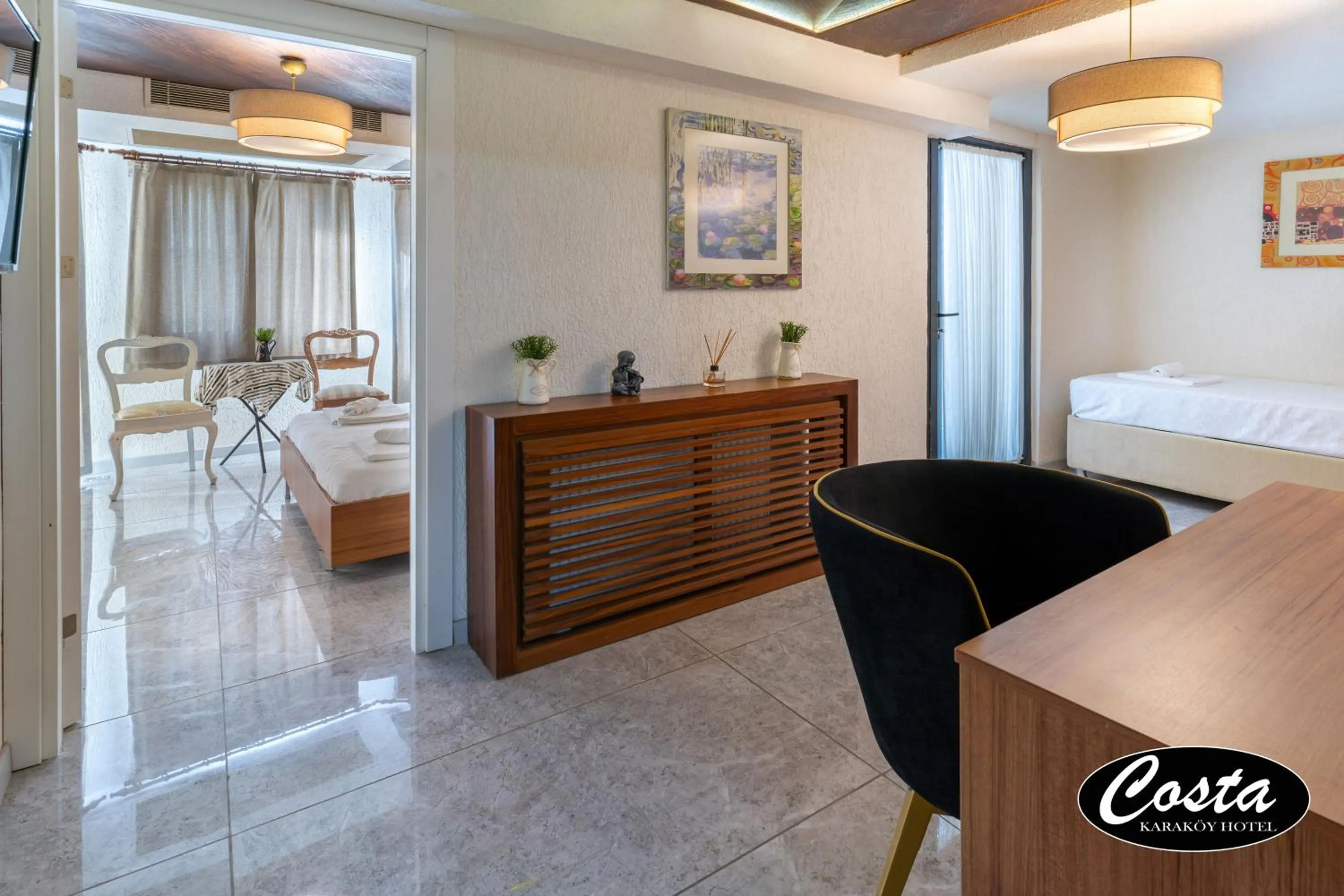 Bed in Costa Karakoy Hotel