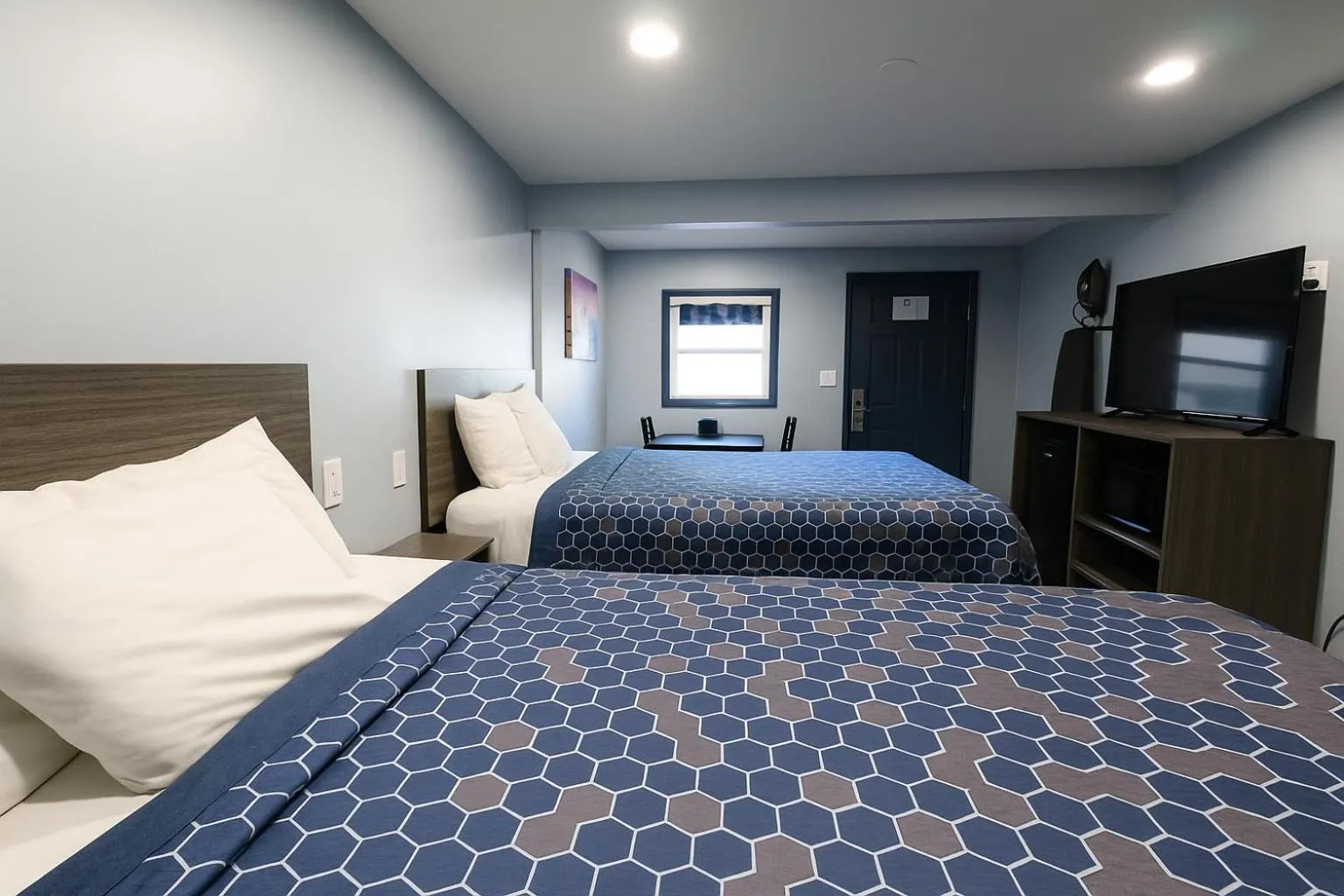 Bed in Hillsboro Inn & Suites