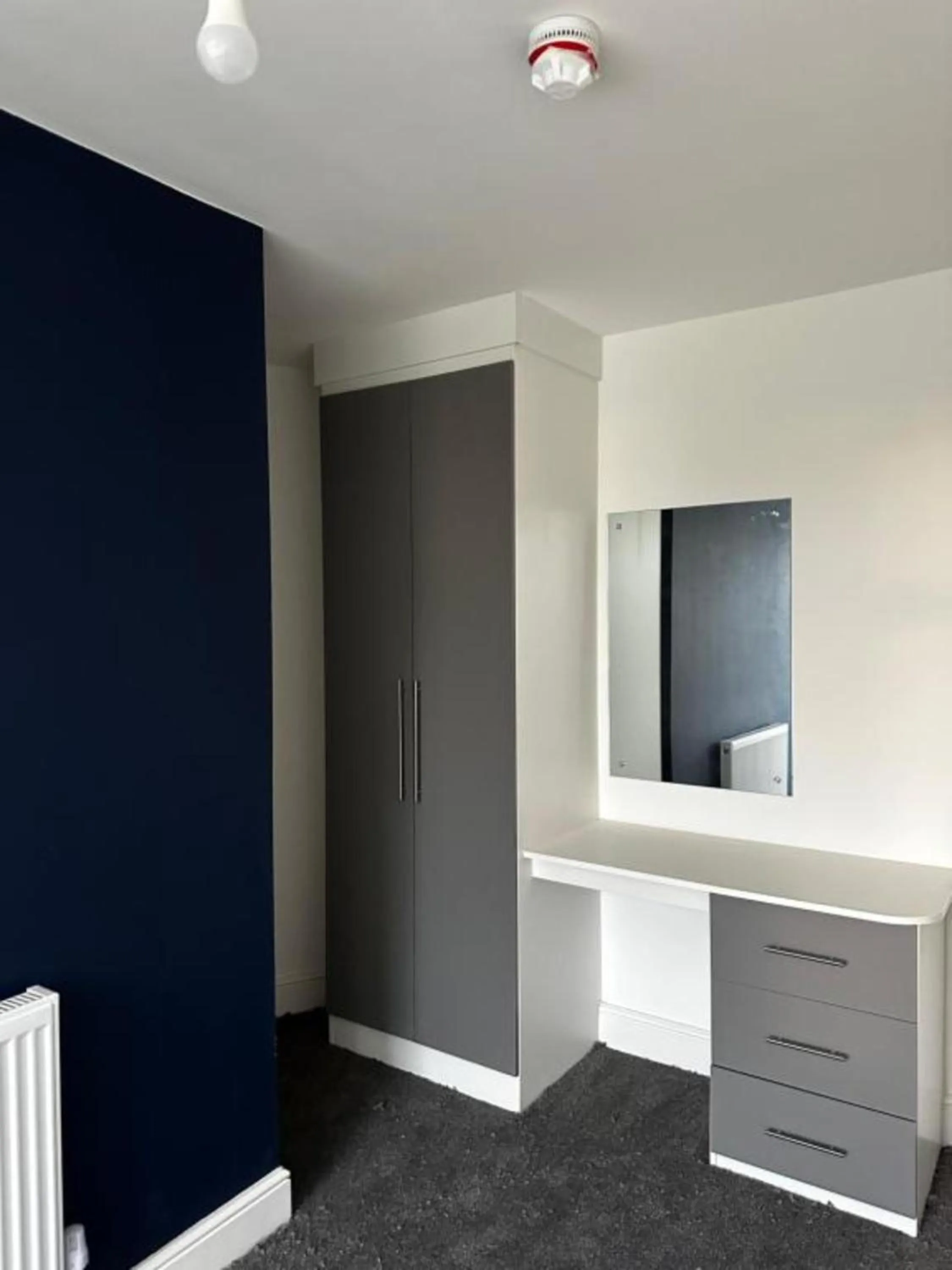 wardrobe in OYO Cheetham Hill Guest House