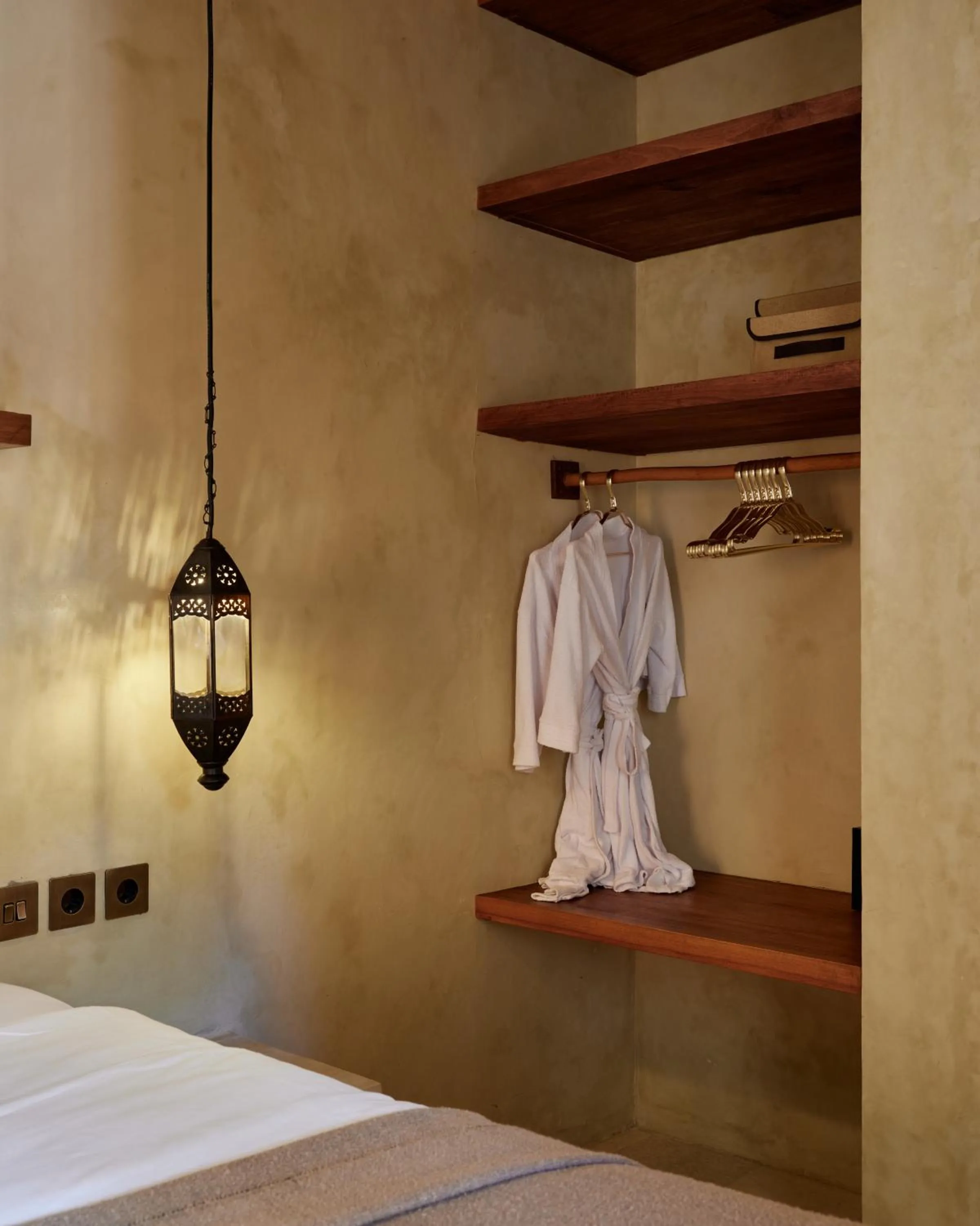 wardrobe, Bed in Lina Boutique Villas and Spa