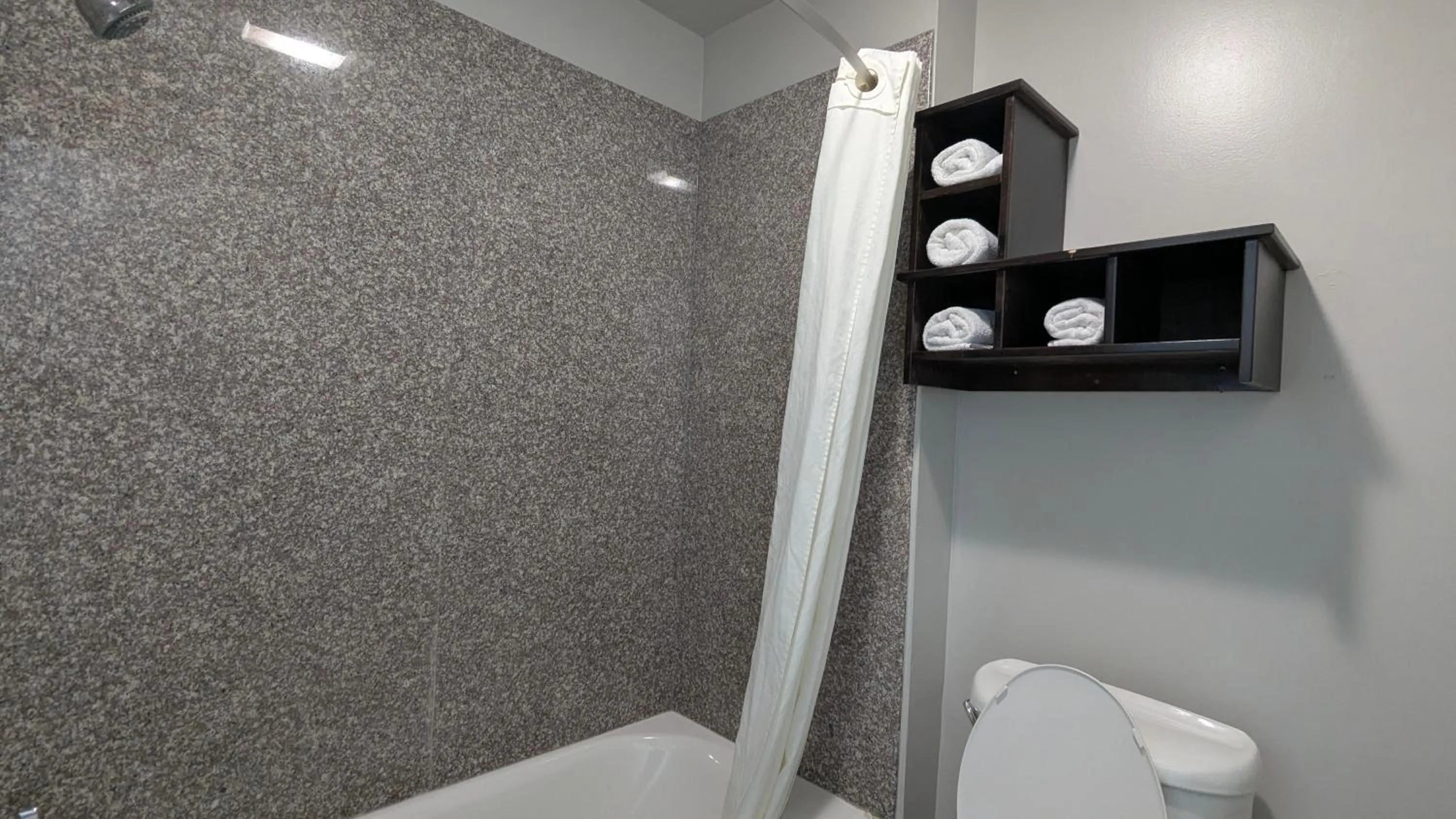 Bathroom in Super 8 by Wyndham Willowbrook Houston