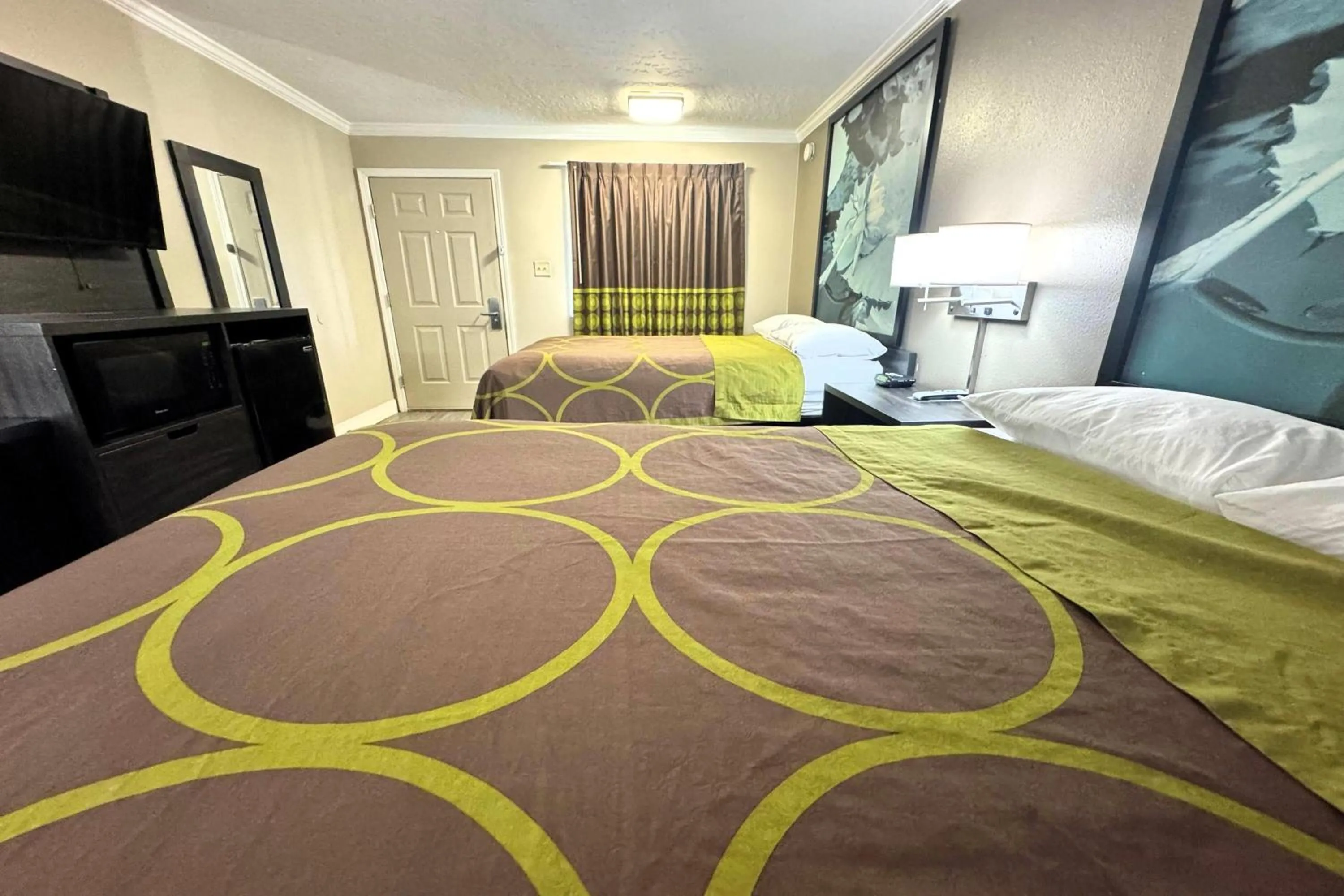 Photo of the whole room, Bed in Super 8 by Wyndham Picayune