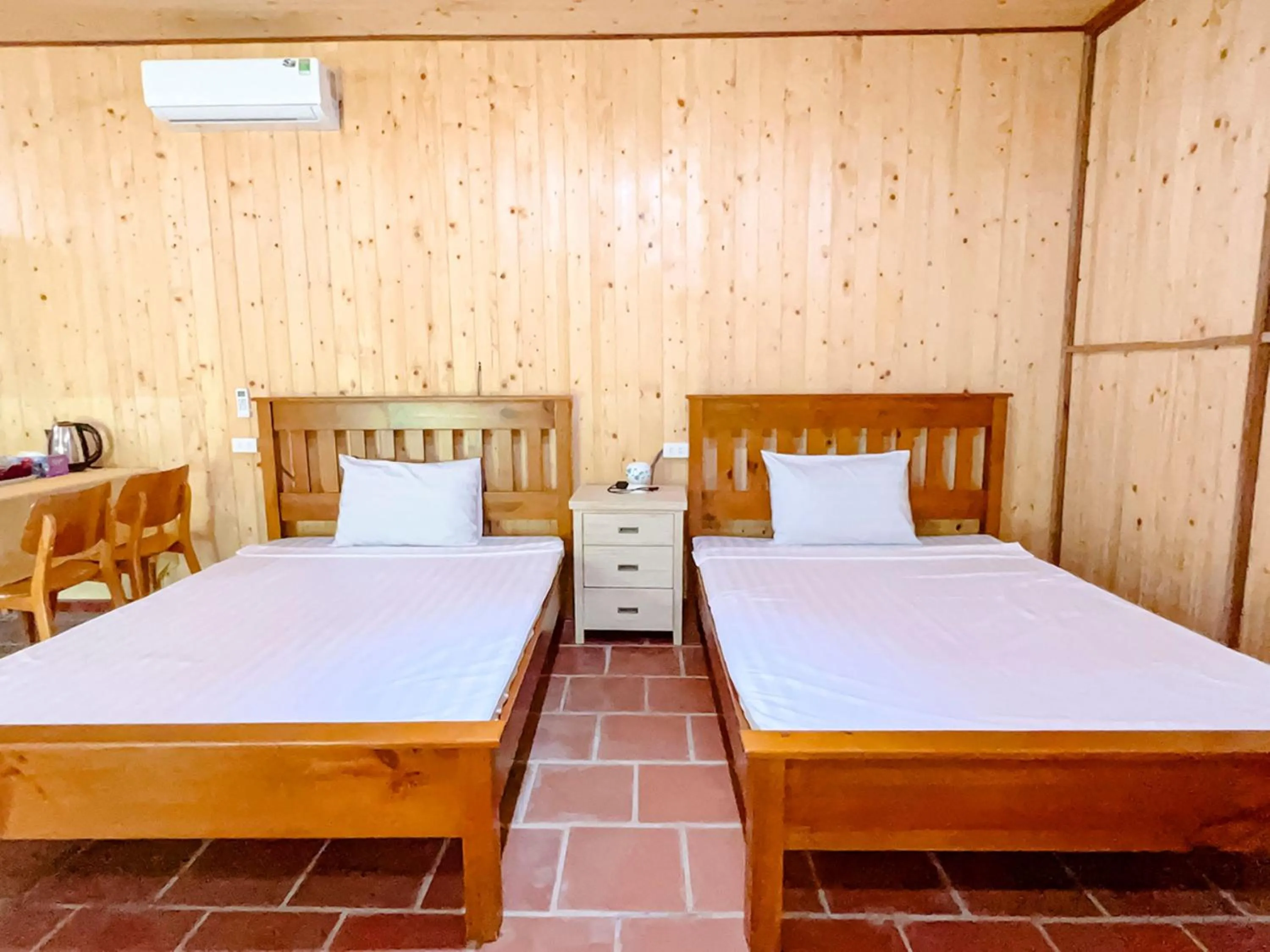 Bed in Me bungalow beach resort