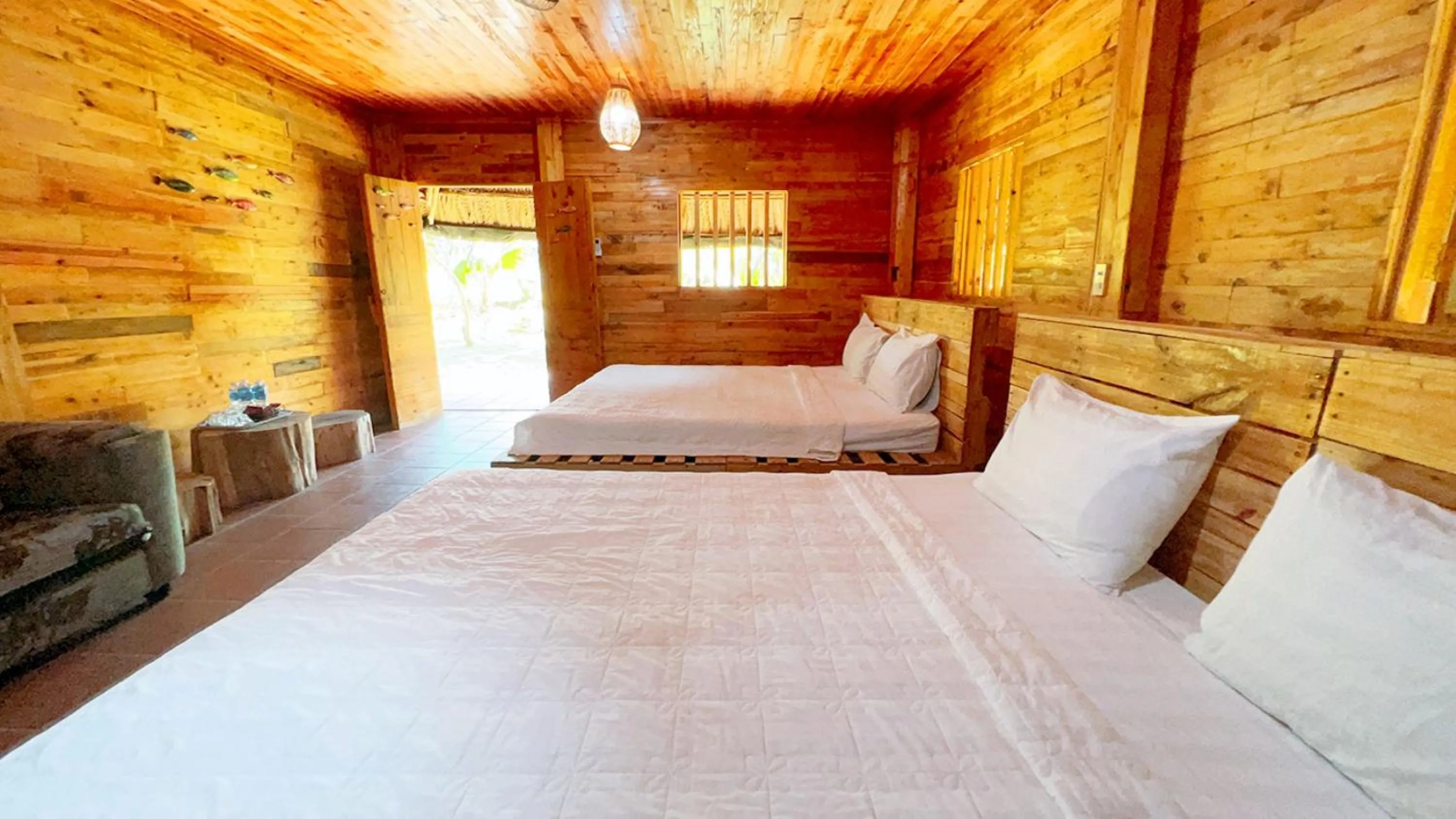 Bed in Me bungalow beach resort