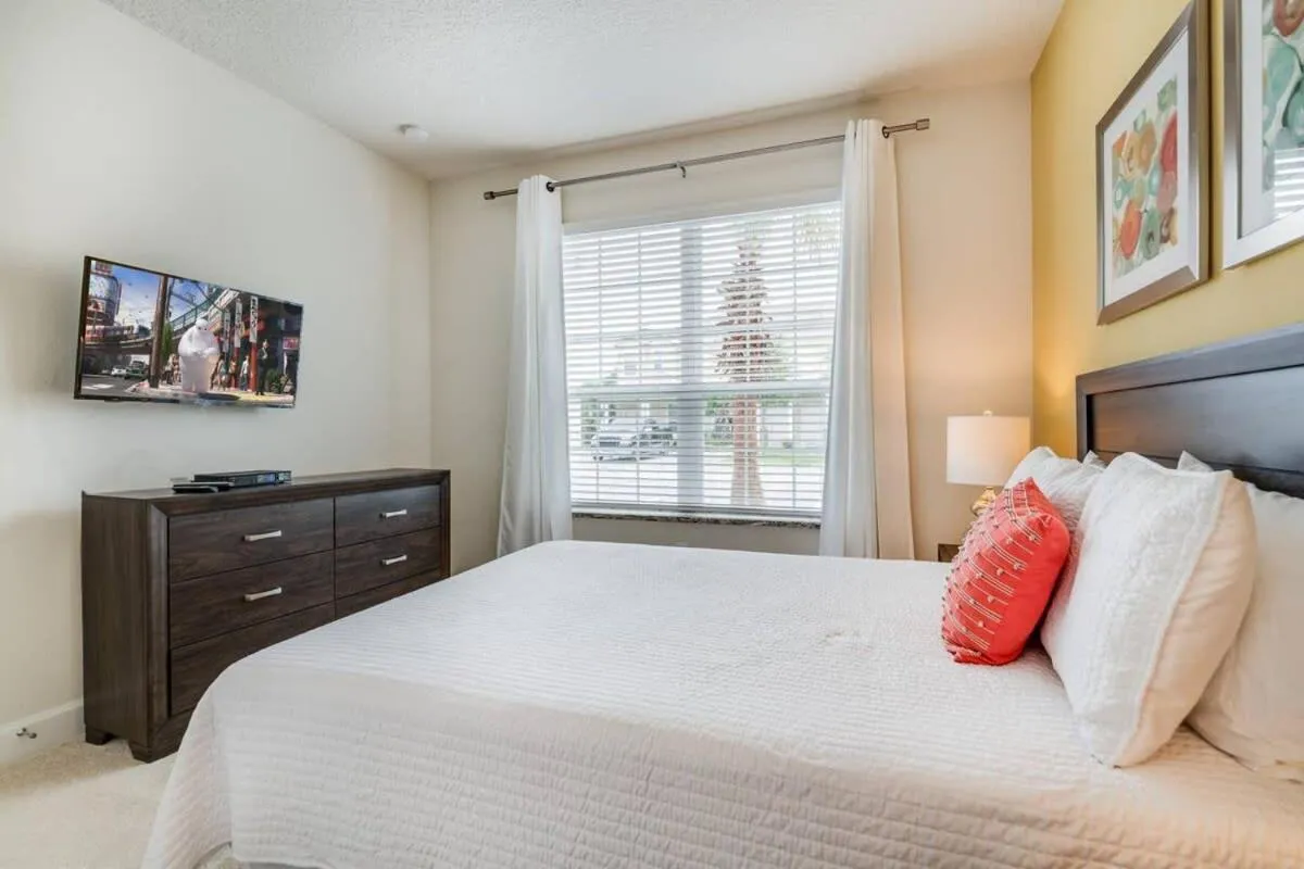 Bed in Ultimate Getaway - Your Best Vacation Home