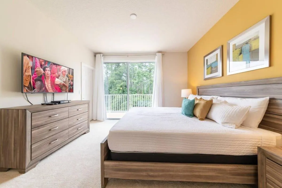 Bed in Ultimate Getaway - Your Best Vacation Home