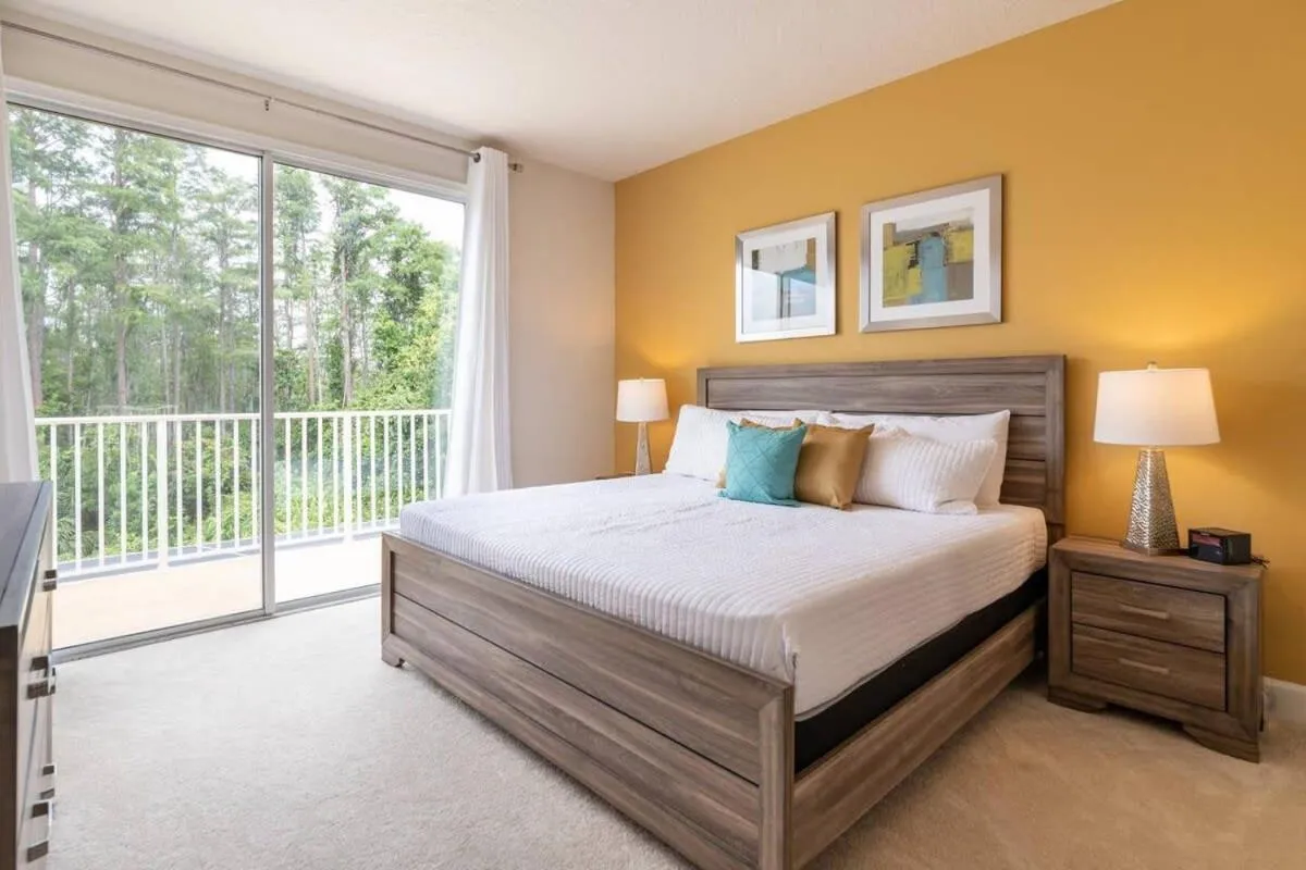 Bed in Ultimate Getaway - Your Best Vacation Home