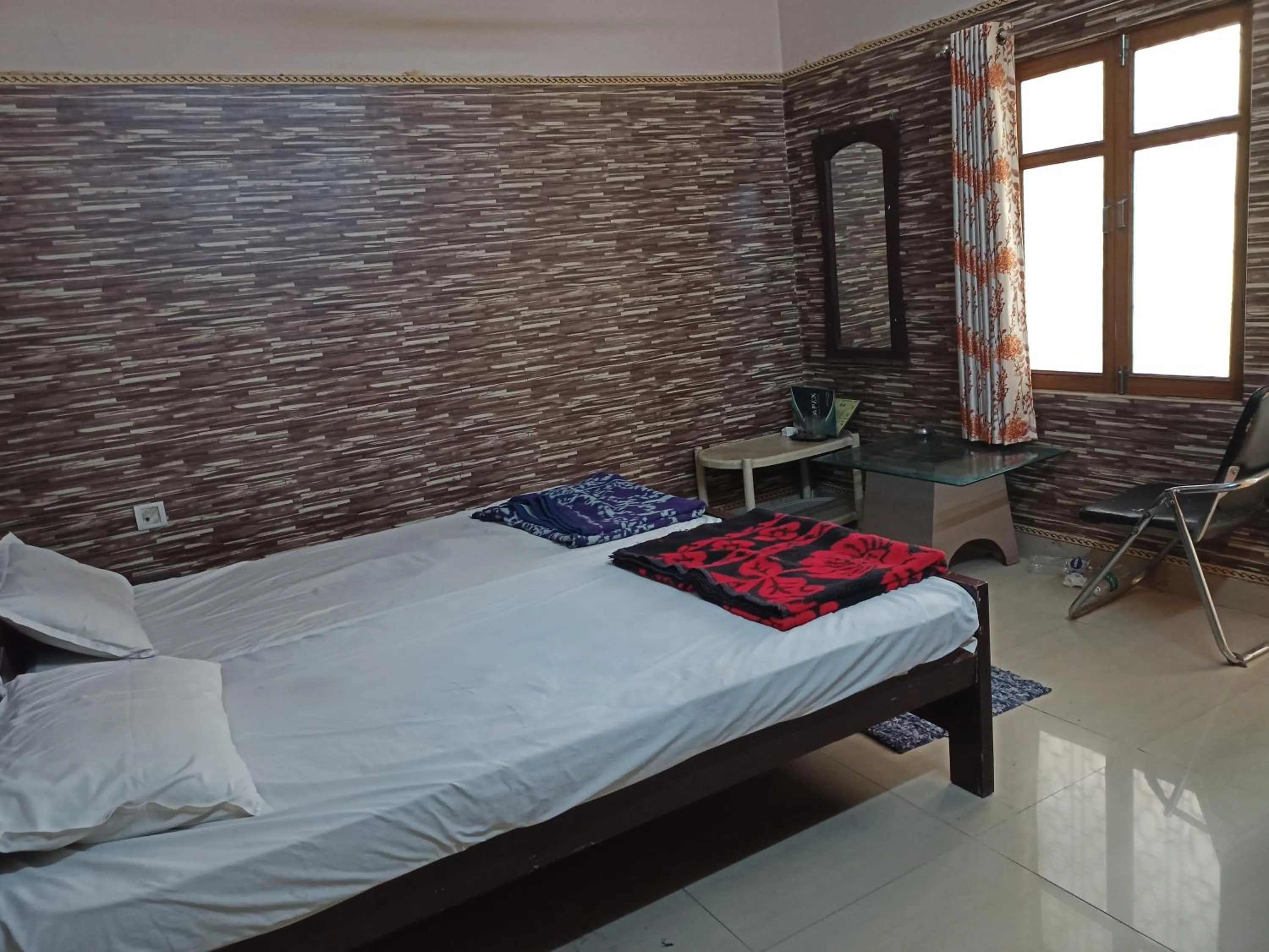 Bedroom in Teerth Guest House