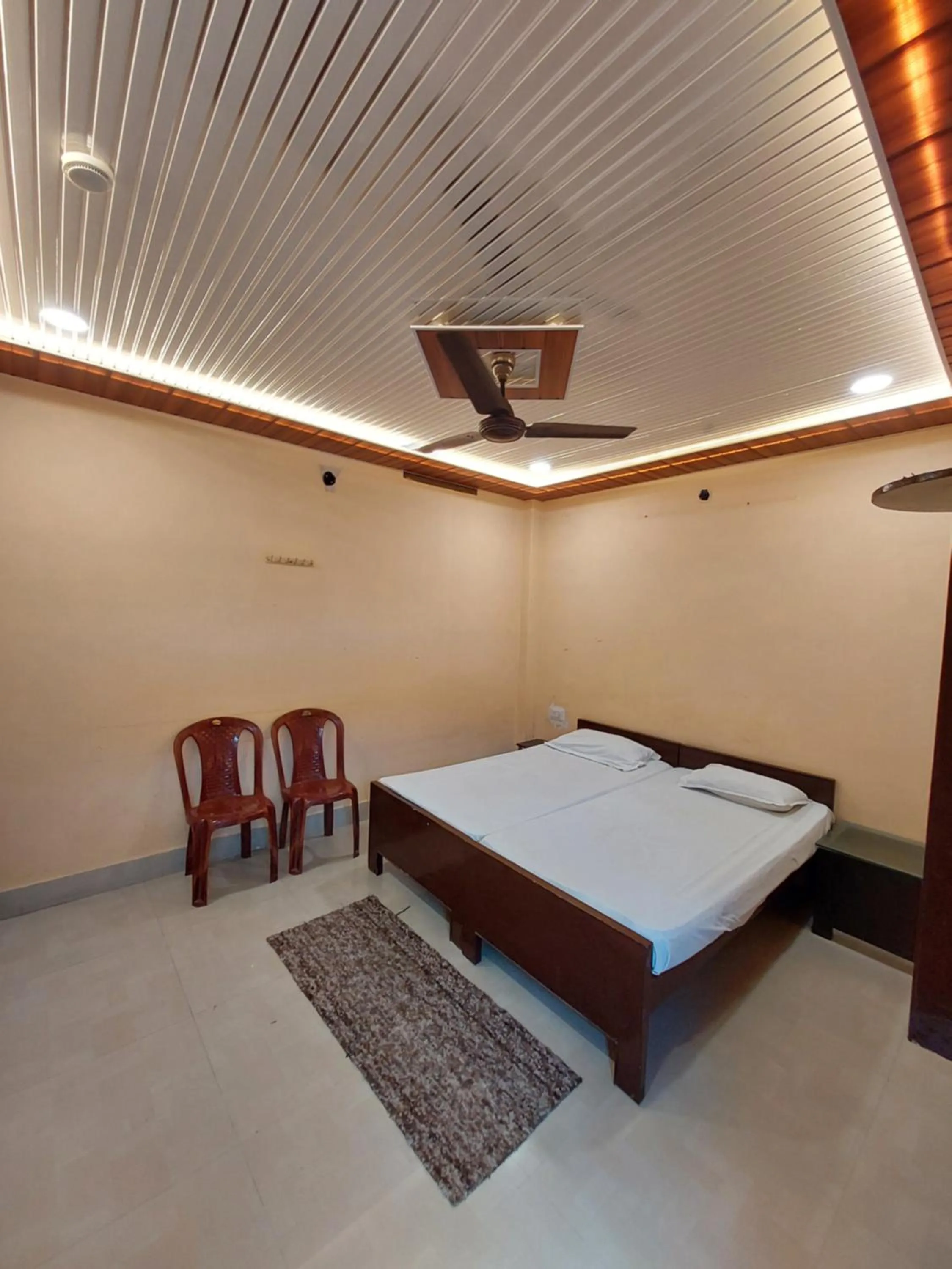 Bedroom in Teerth Guest House