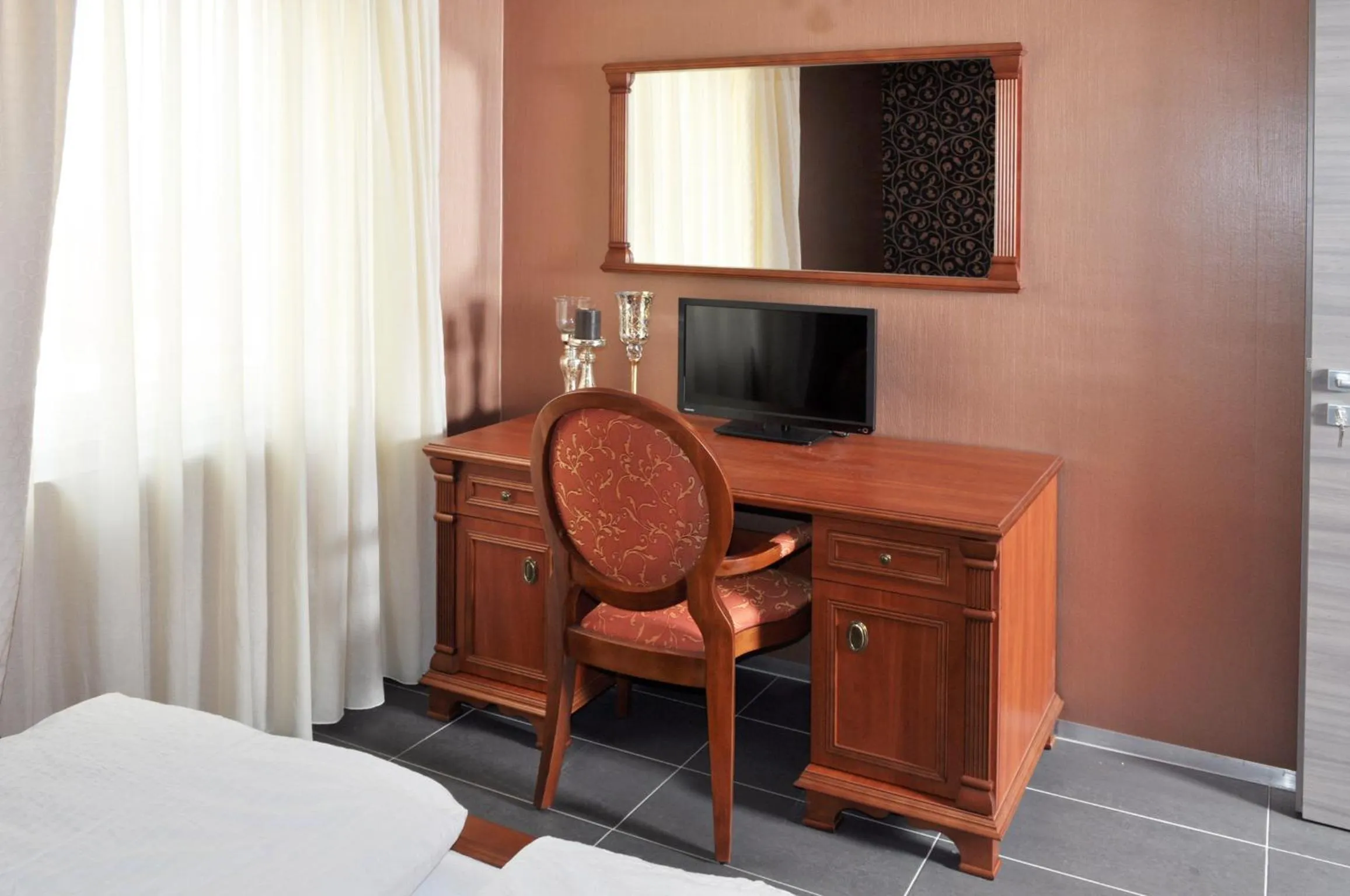 Seating area, Bed in Pension Schlossidyll