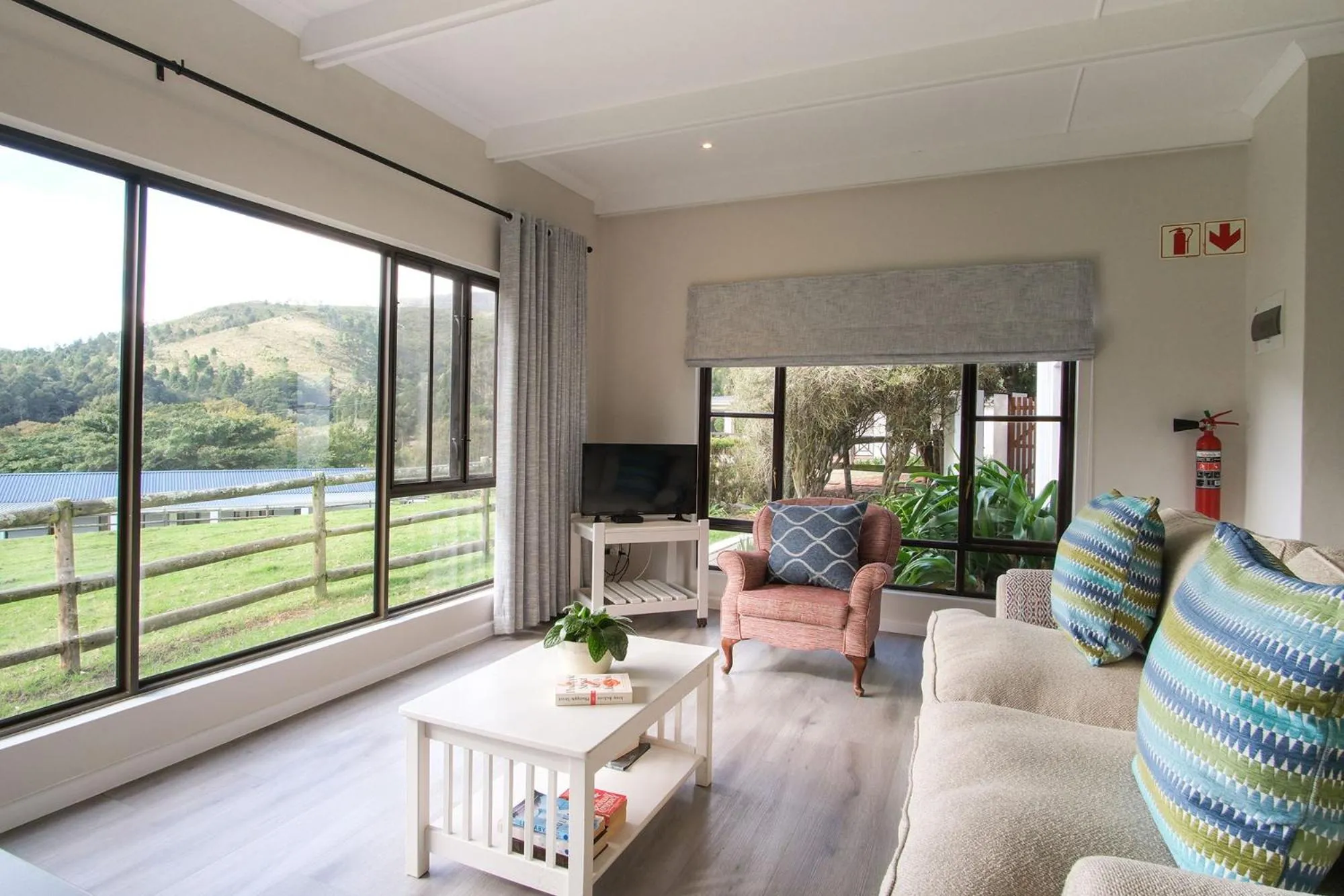 Seating area in High Season Farm Luxury Cottages