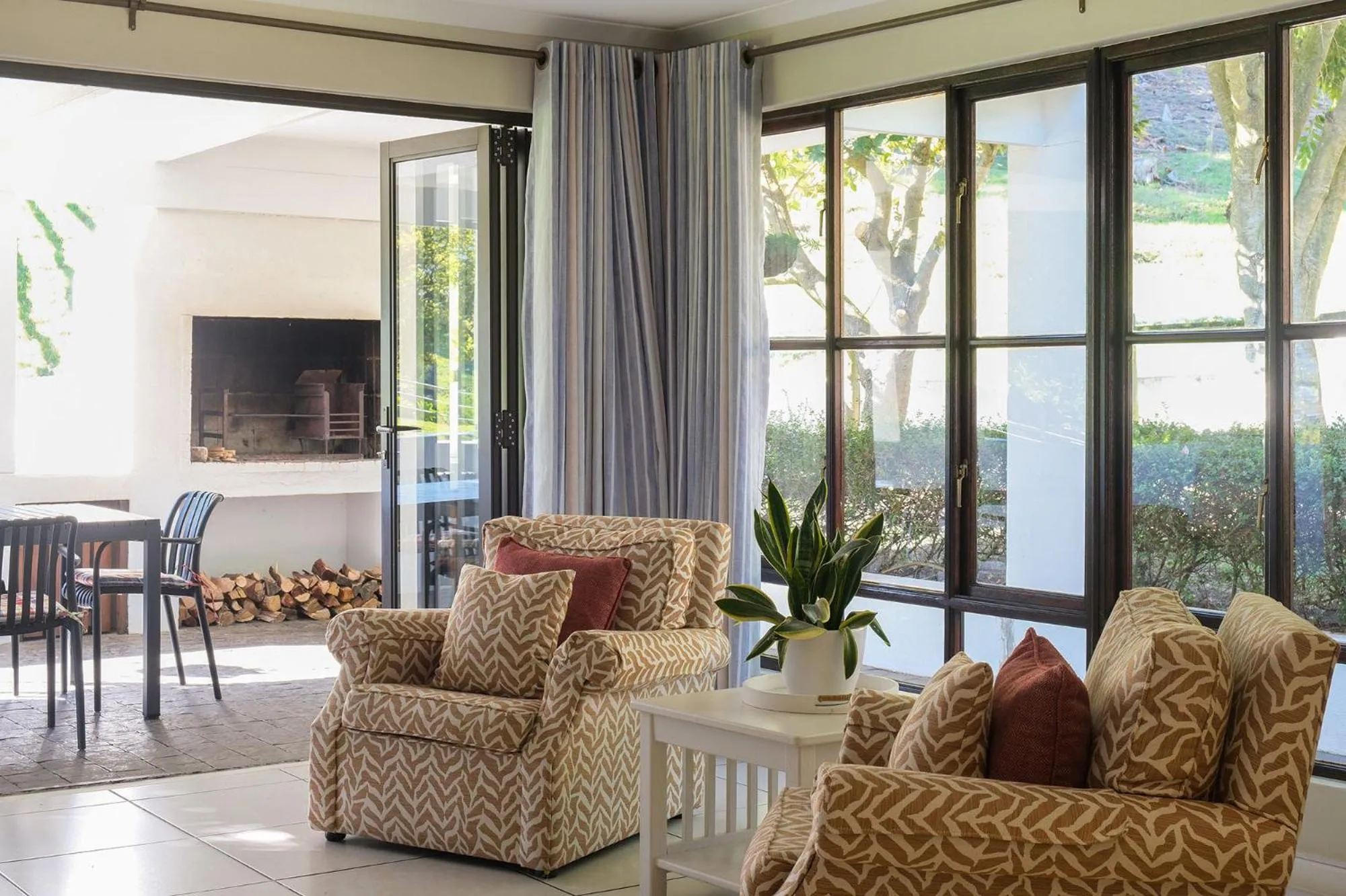 Seating area in High Season Farm Luxury Cottages