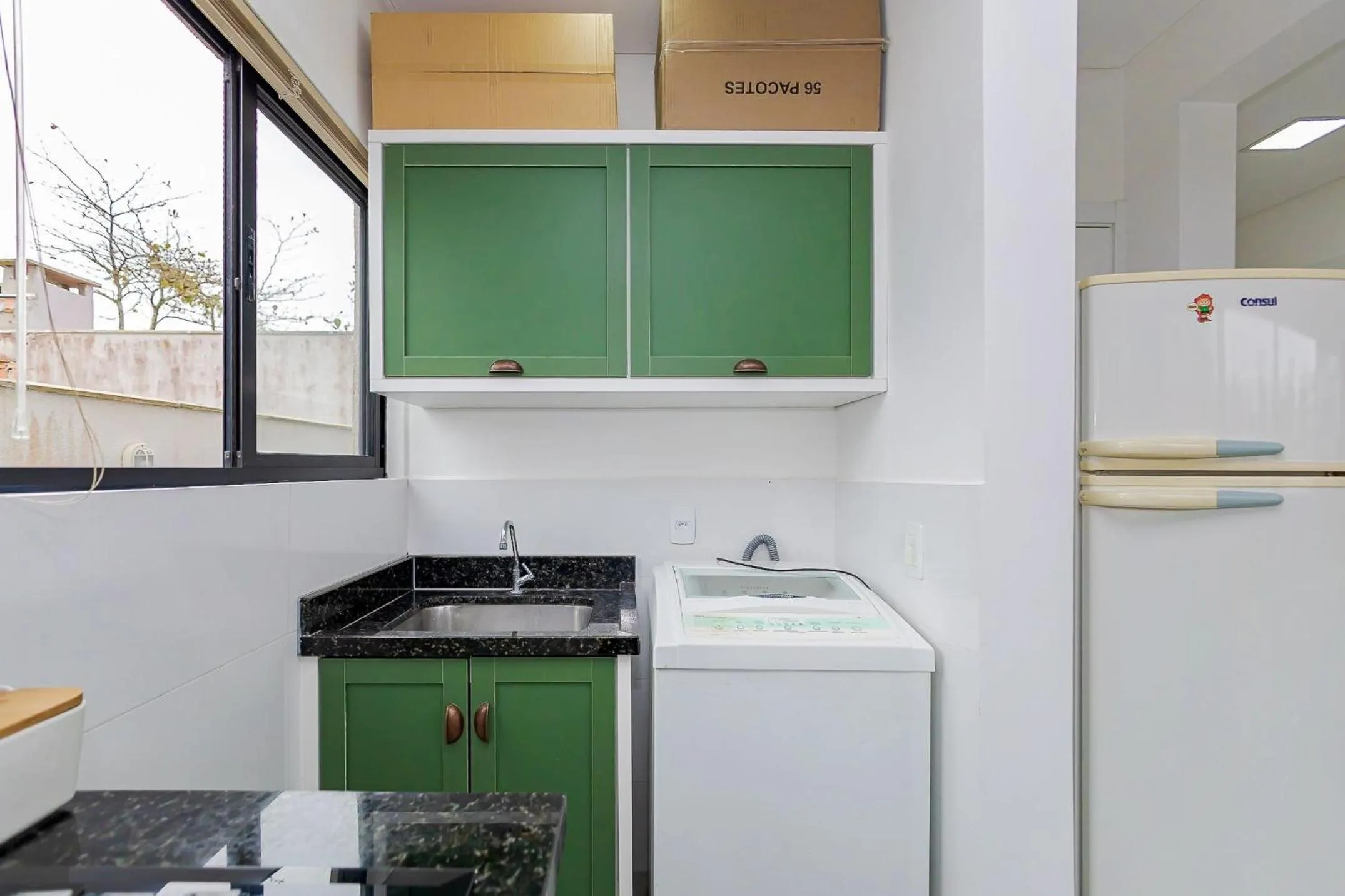 Kitchen or kitchenette in 150m da praia em um fantástico edifício em Balneário Piçarras