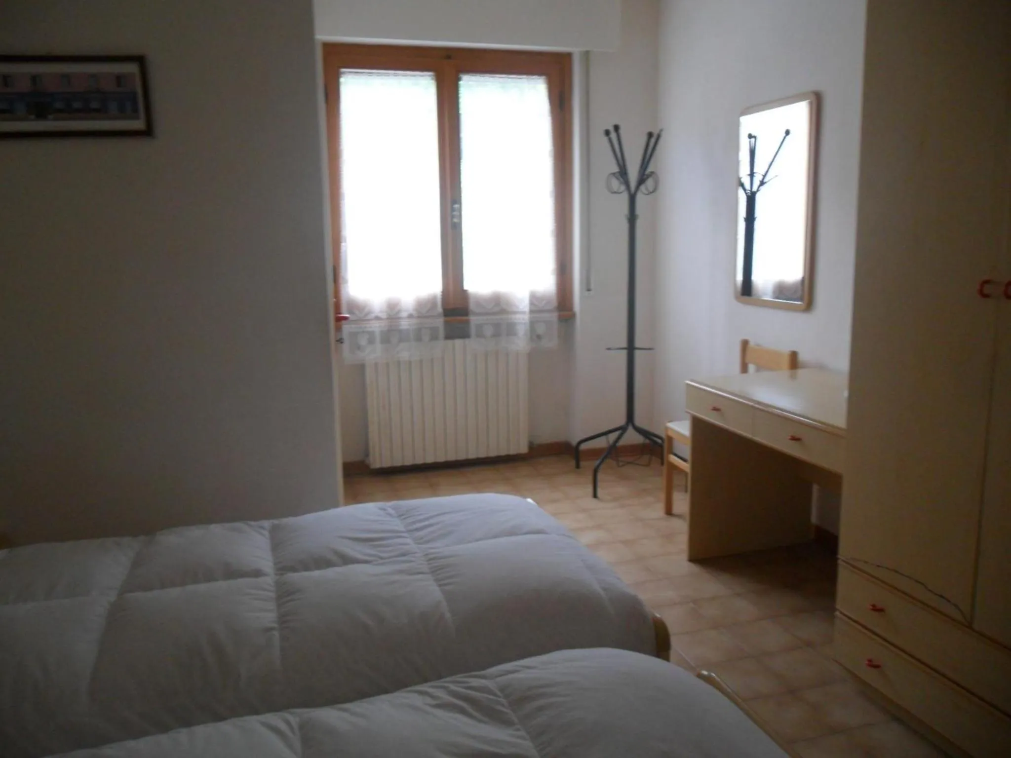 Bed in Albergo Giardino