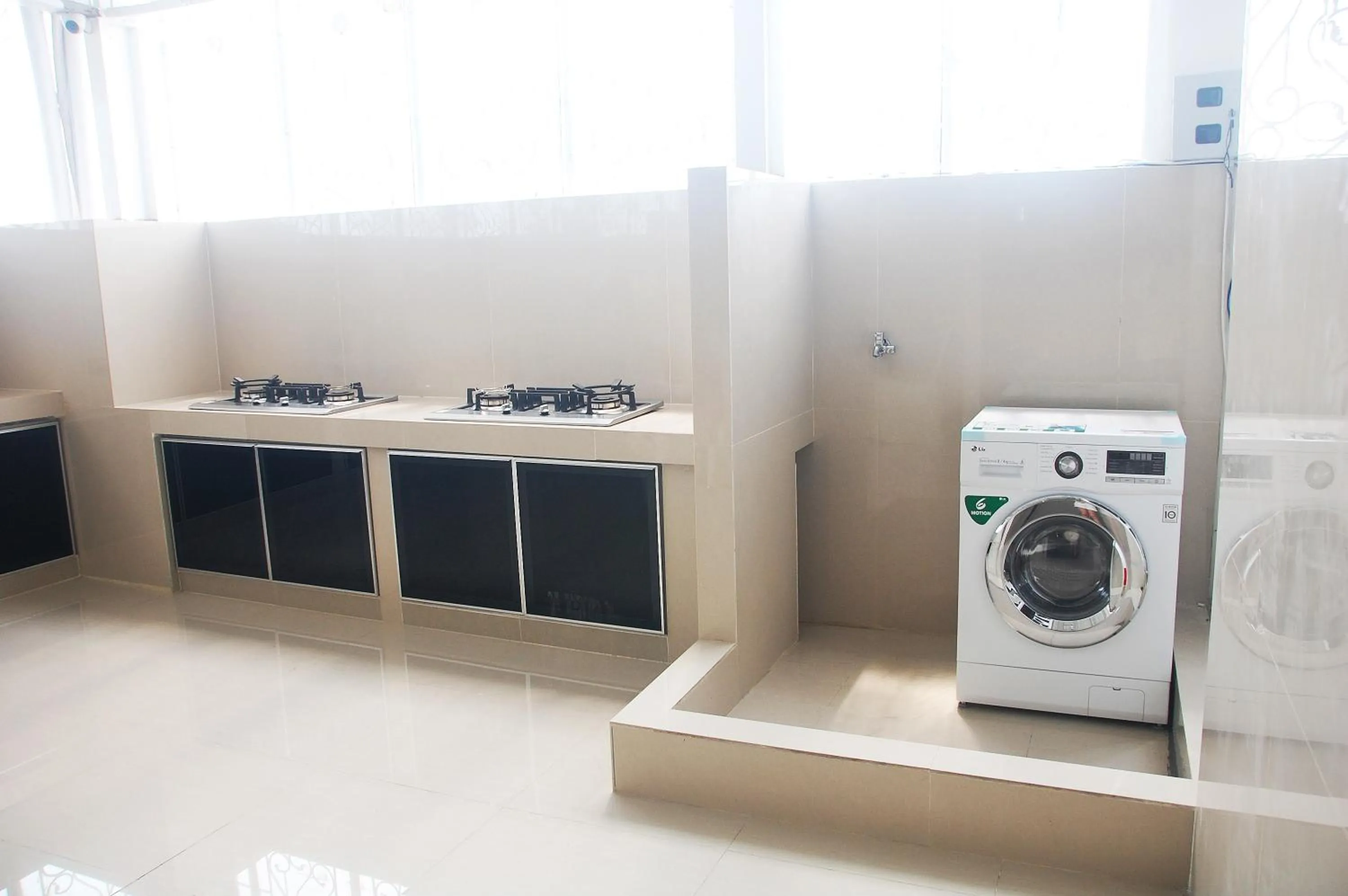 Kitchen or kitchenette in Gandhi Inn