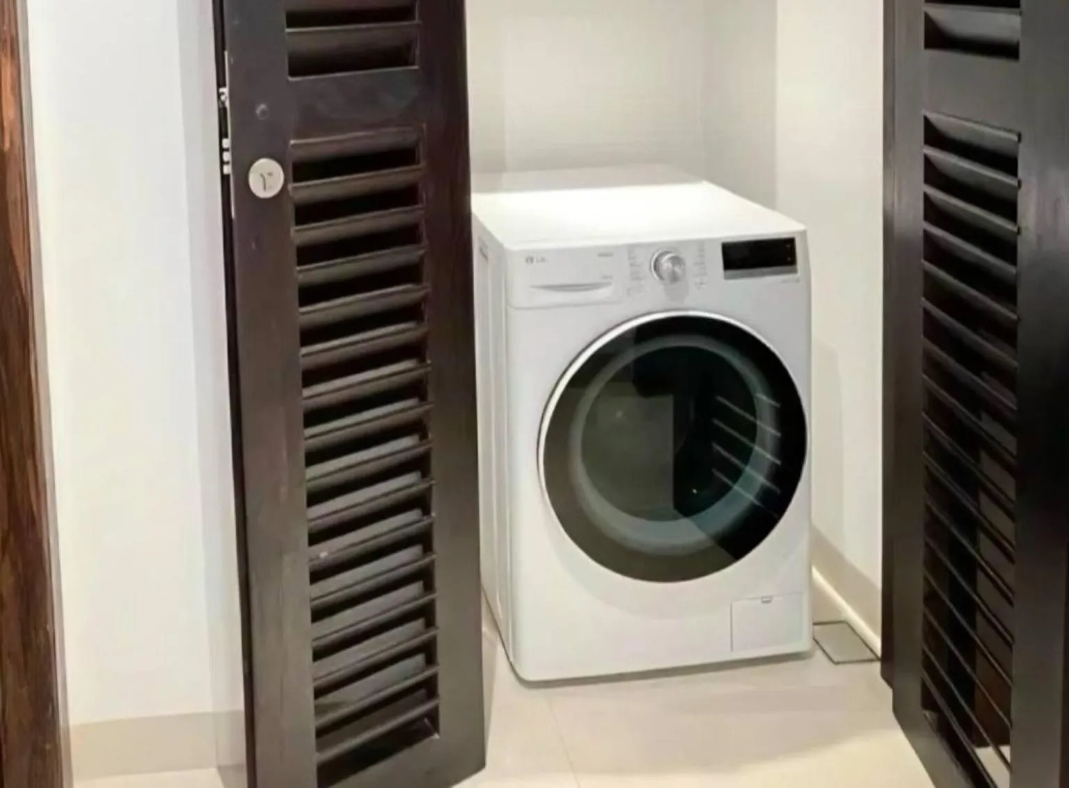 washing machine in Velea Serviced Apartments & Suites