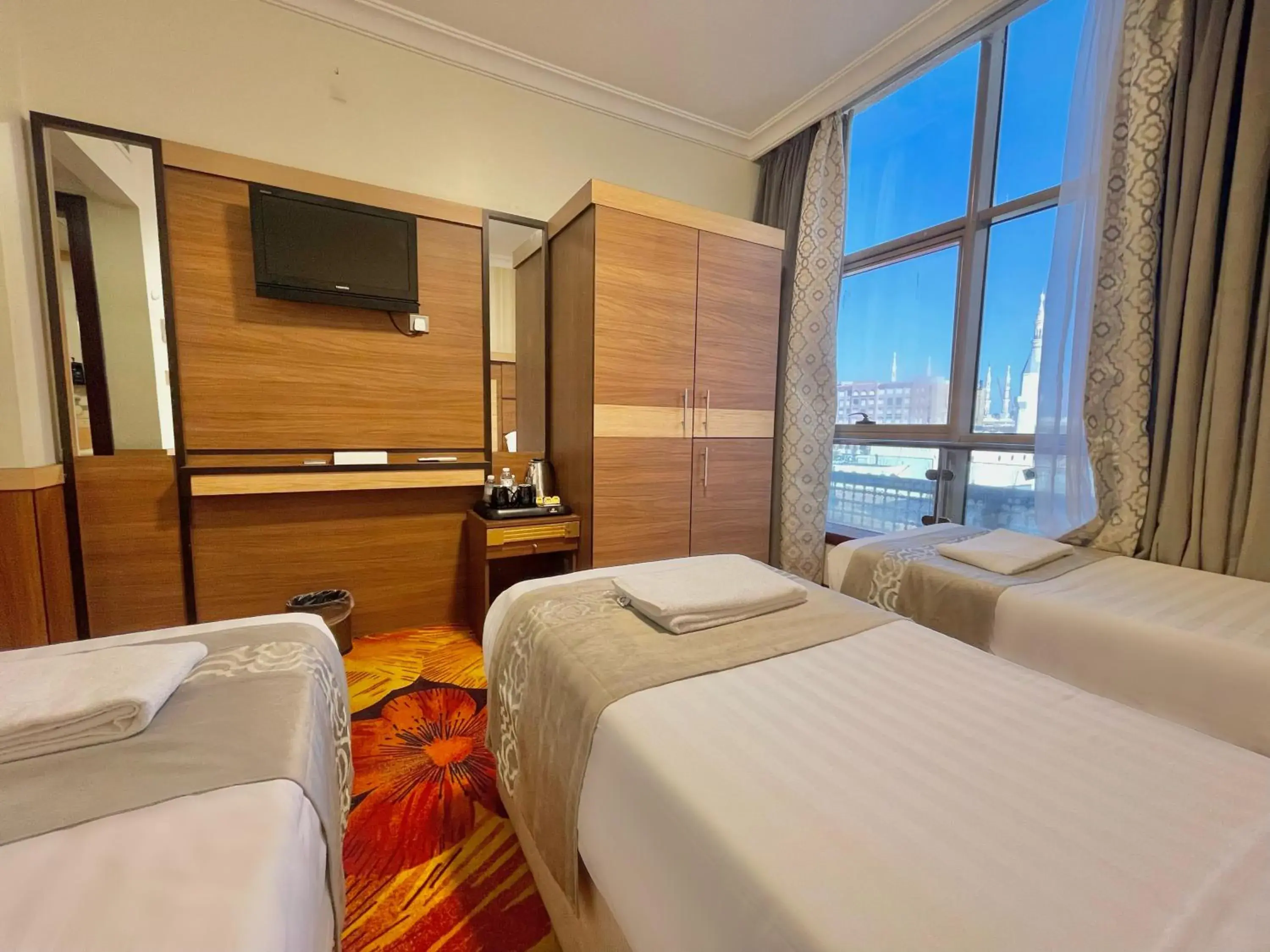 Triple Room - single occupancy in Al Mukhtara Almasi Hotel Triple Room - single occupancy in Al Mukhtara Almasi Hotel