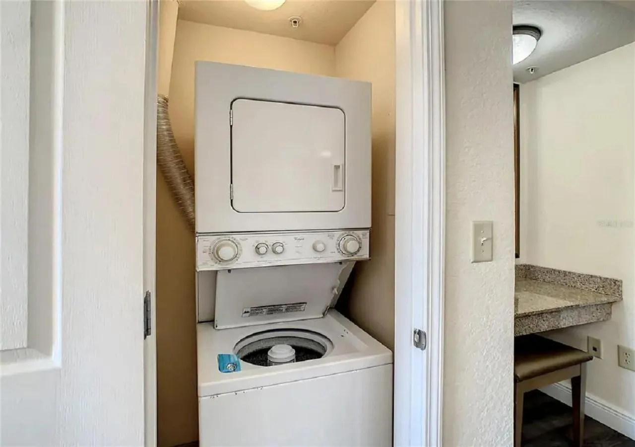 washing machine in Cozy Orlando Resort Condo 4Mi from Disney