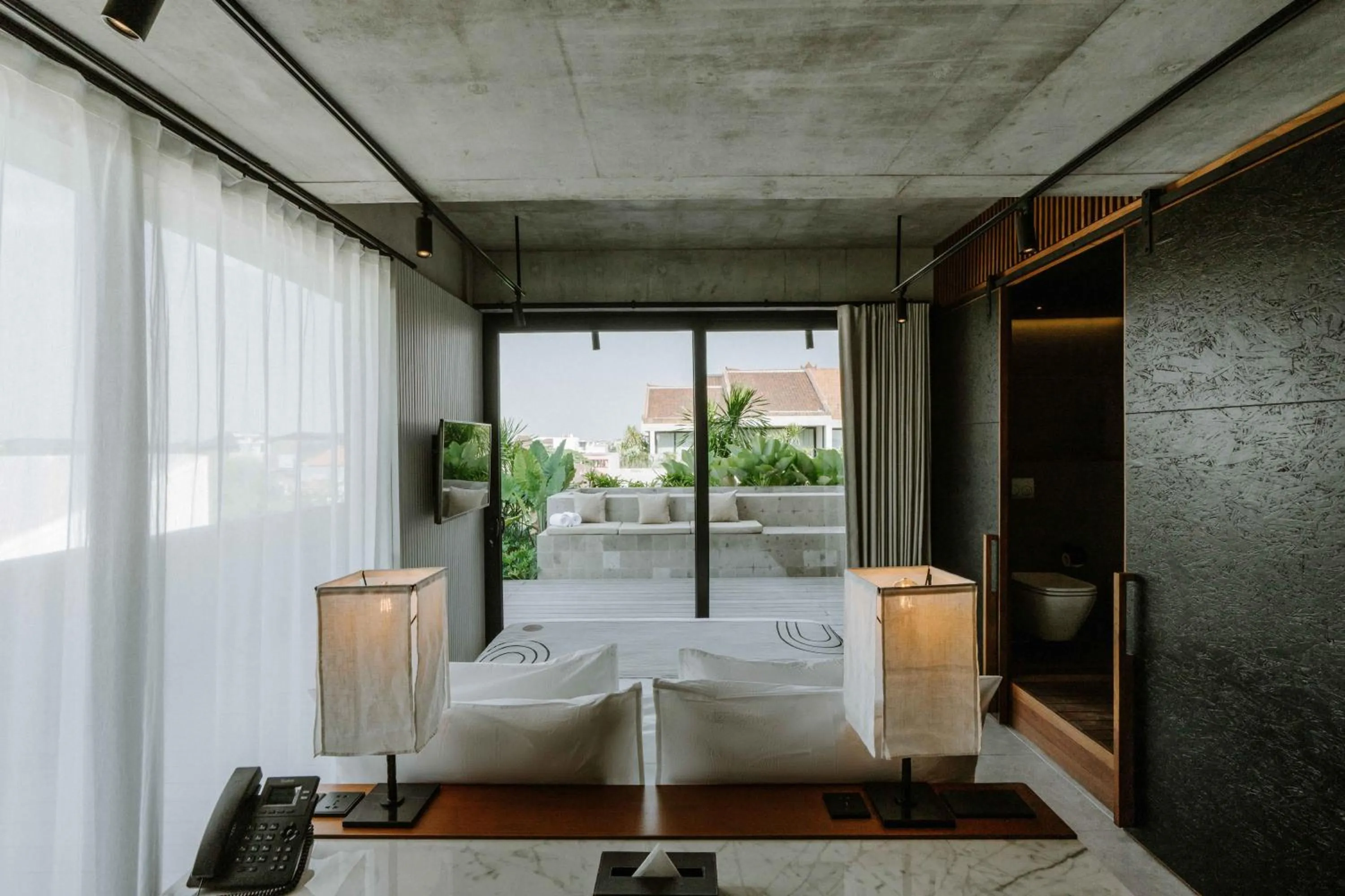 Photo of the whole room, Bed in The Komu Canggu Bali
